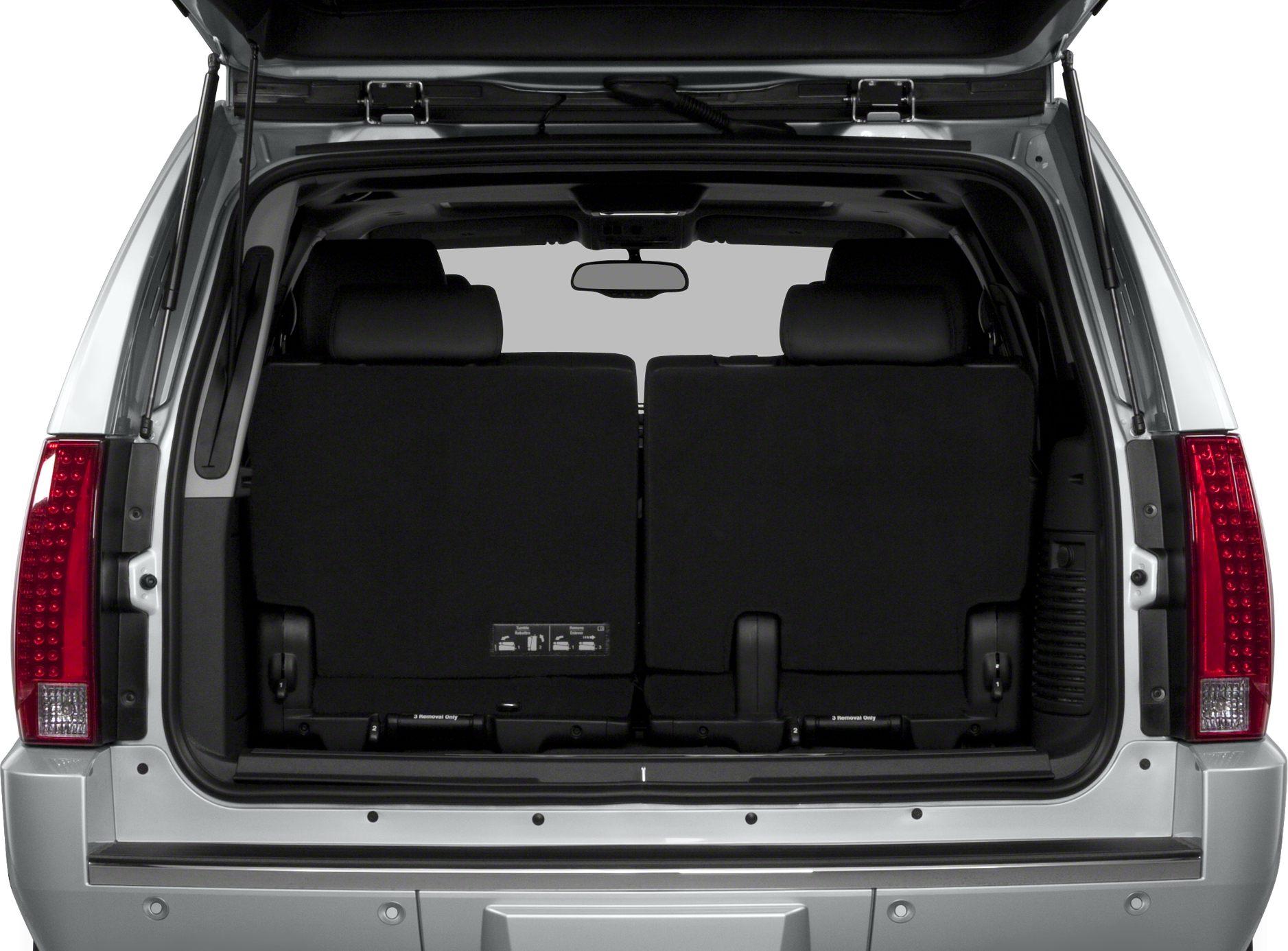 Rear cargo space with folded third-row seats and vertical LED taillights