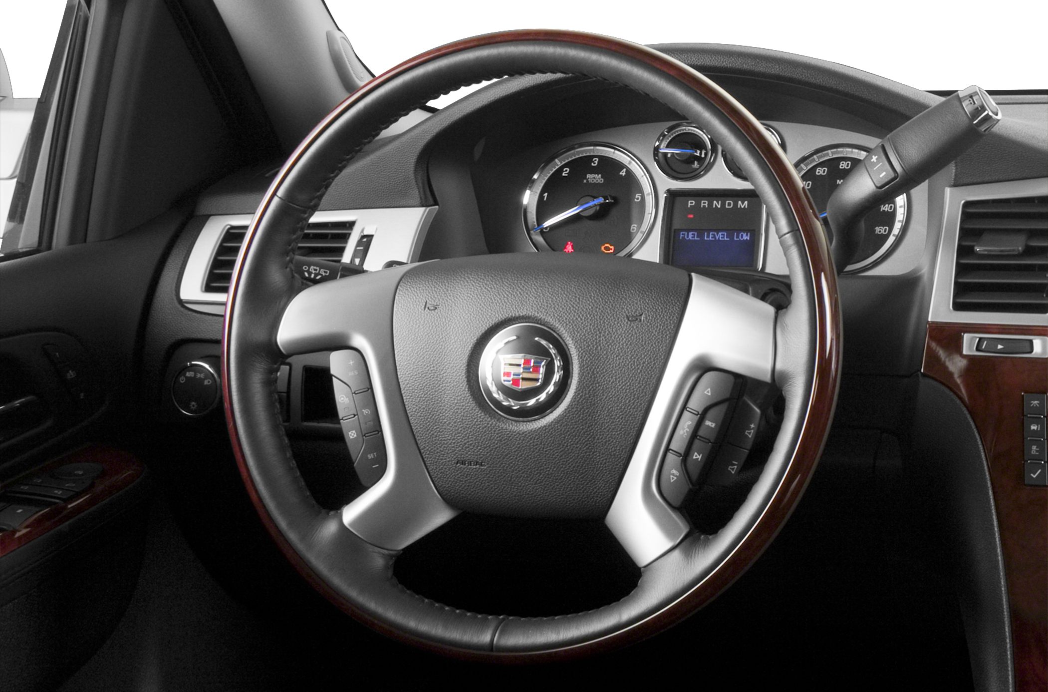 Steering wheel with control buttons and detailed dashboard instruments