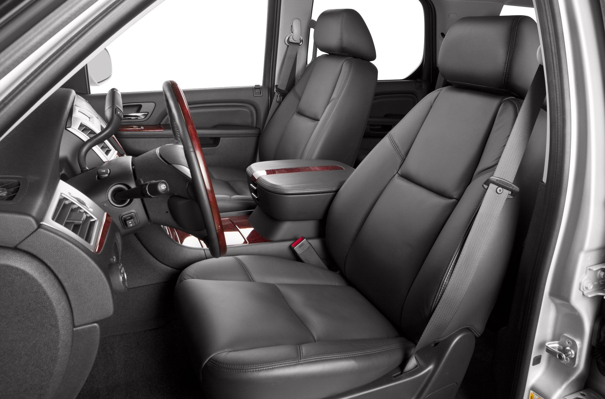 Leather front seats with wood trim and center console armrest.
