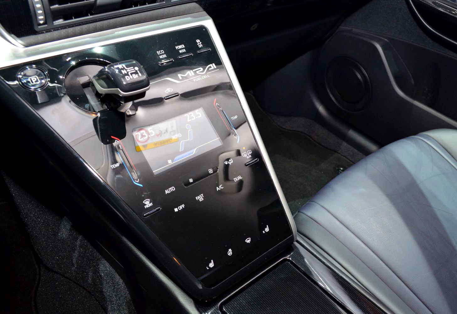 Center console with gear selector and digital climate control panel