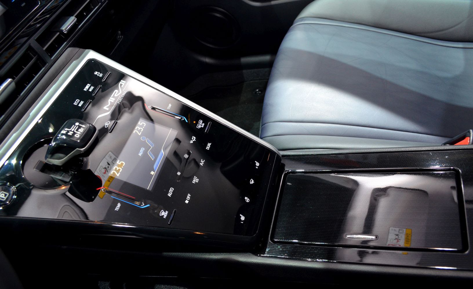 Digital climate control panel and modern gear selector