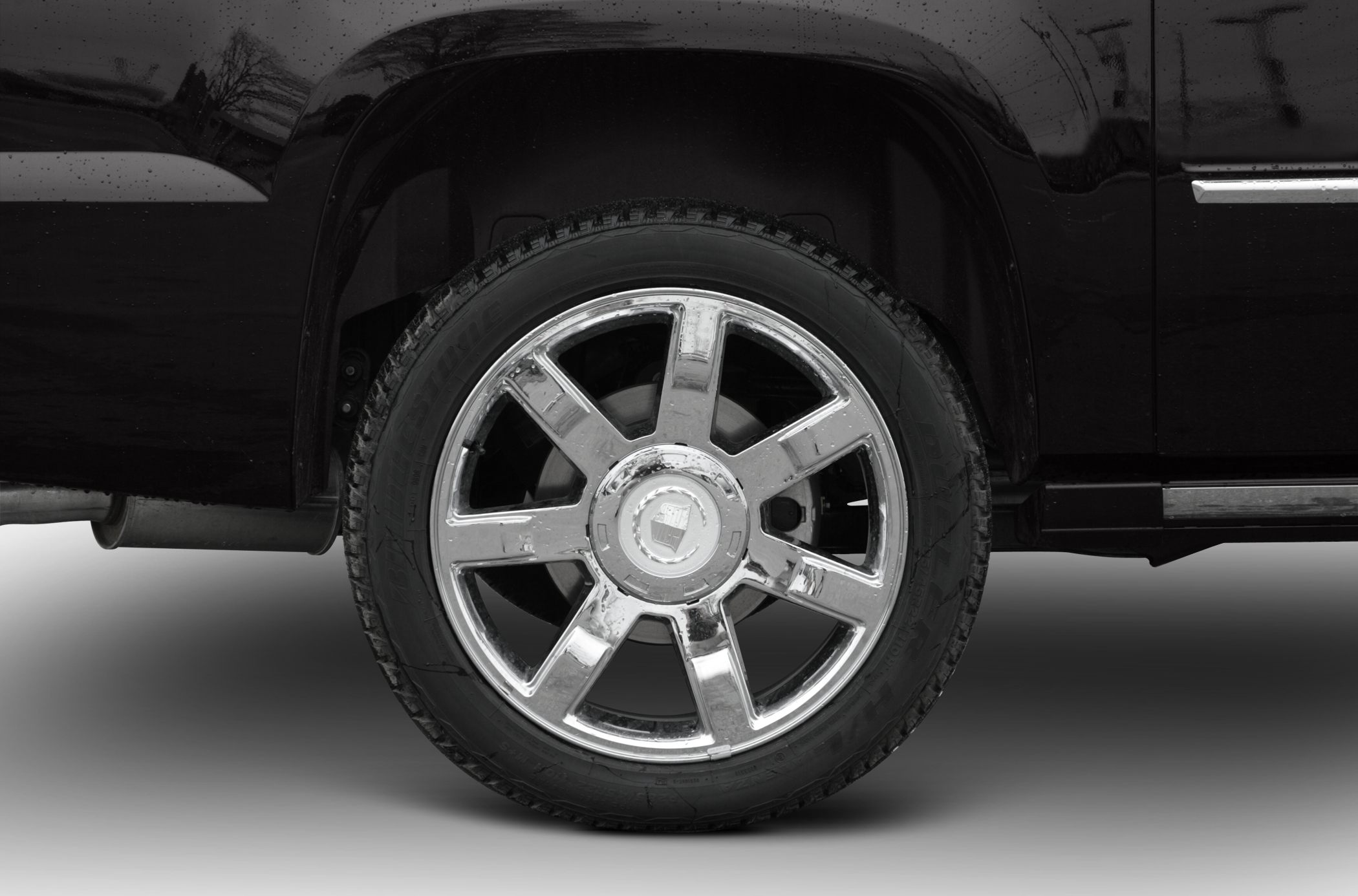 Chrome 7-spoke alloy wheel on rugged tire