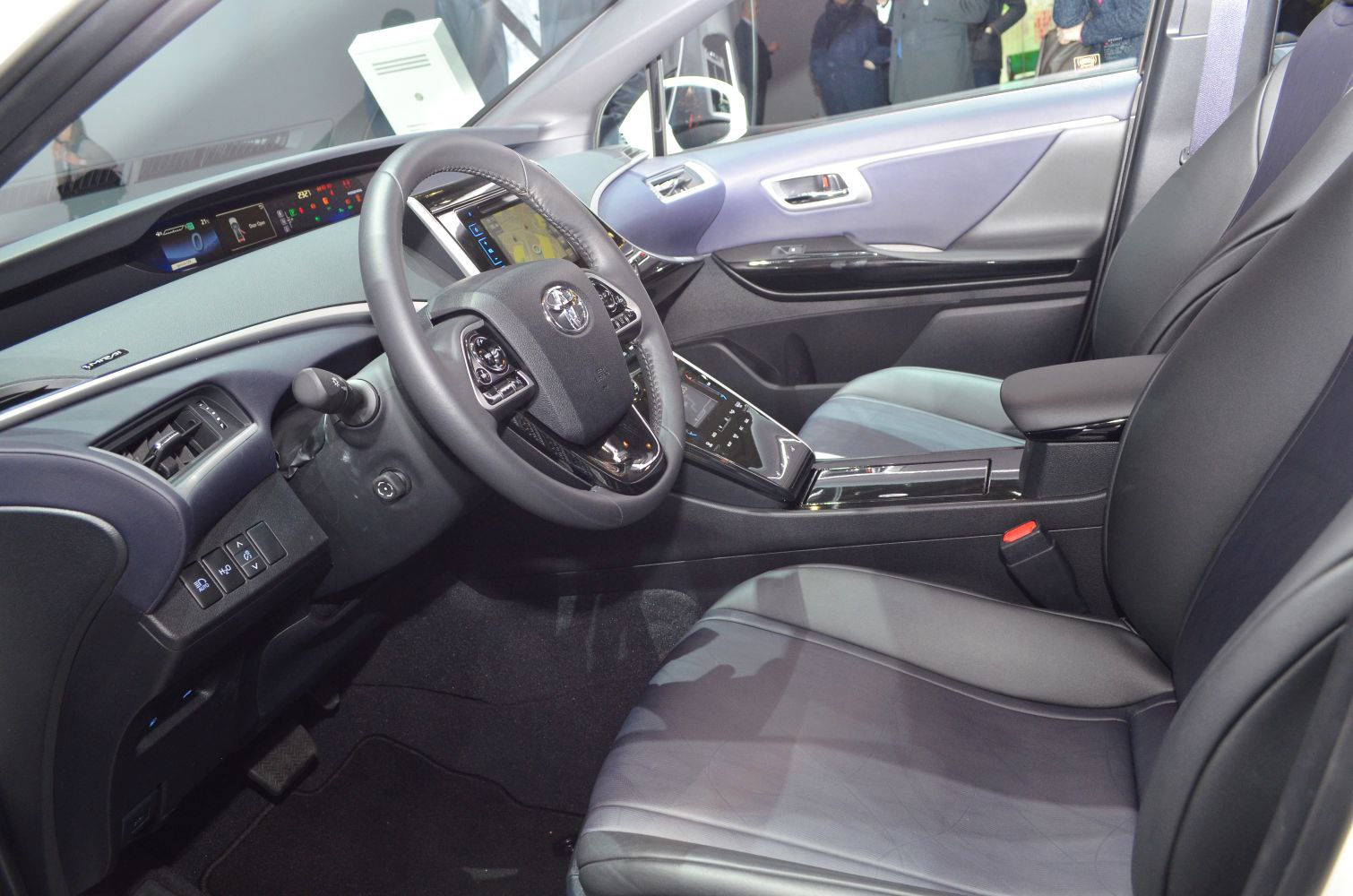 Modern car interior with digital dashboard and steering wheel controls
