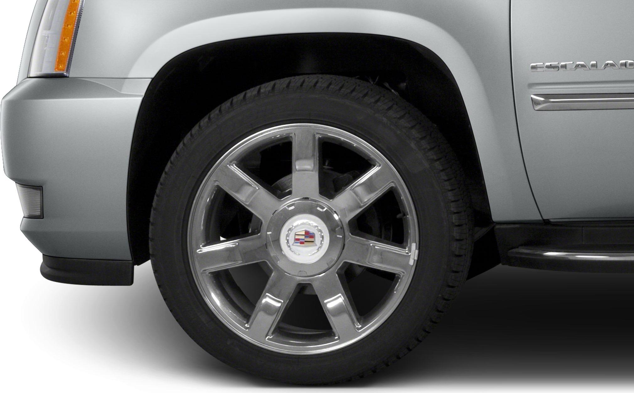 Chrome alloy wheel and side badge close-up