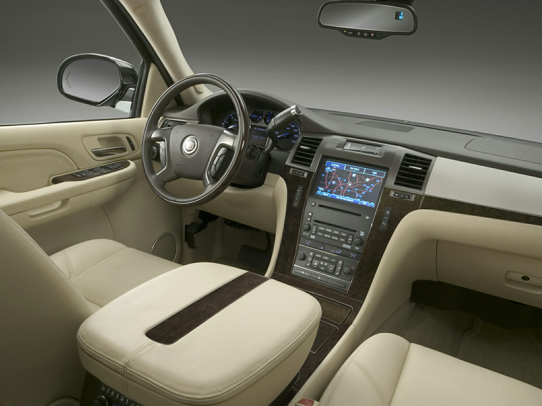 Luxury SUV interior with leather seats and navigation system