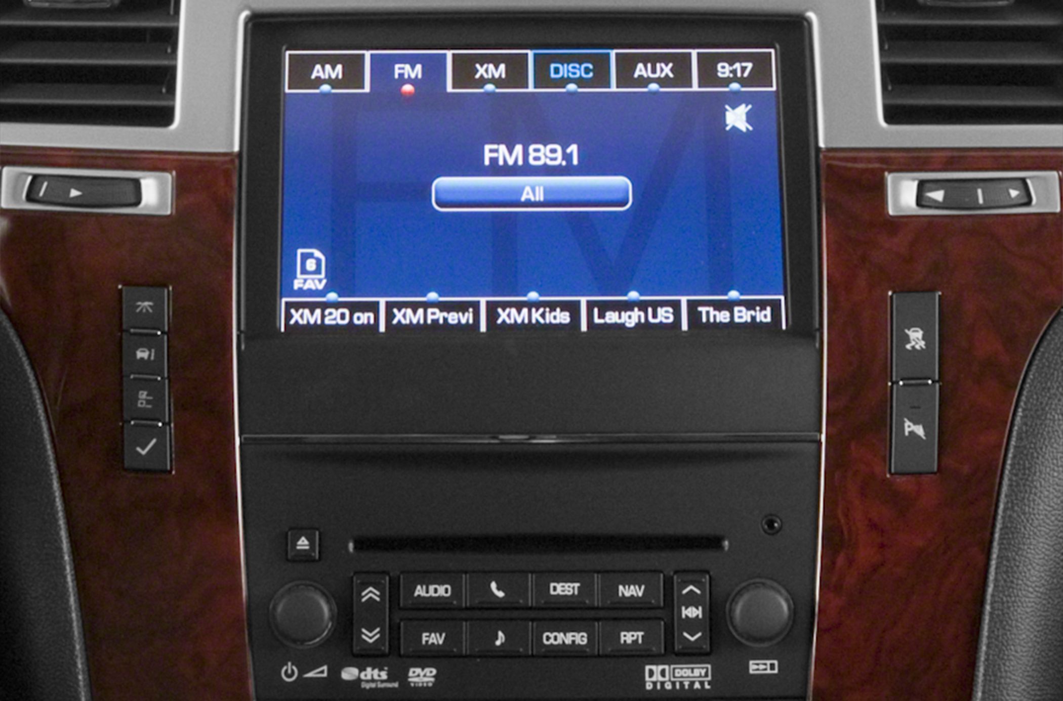Touchscreen infotainment display with multiple media and navigation controls.