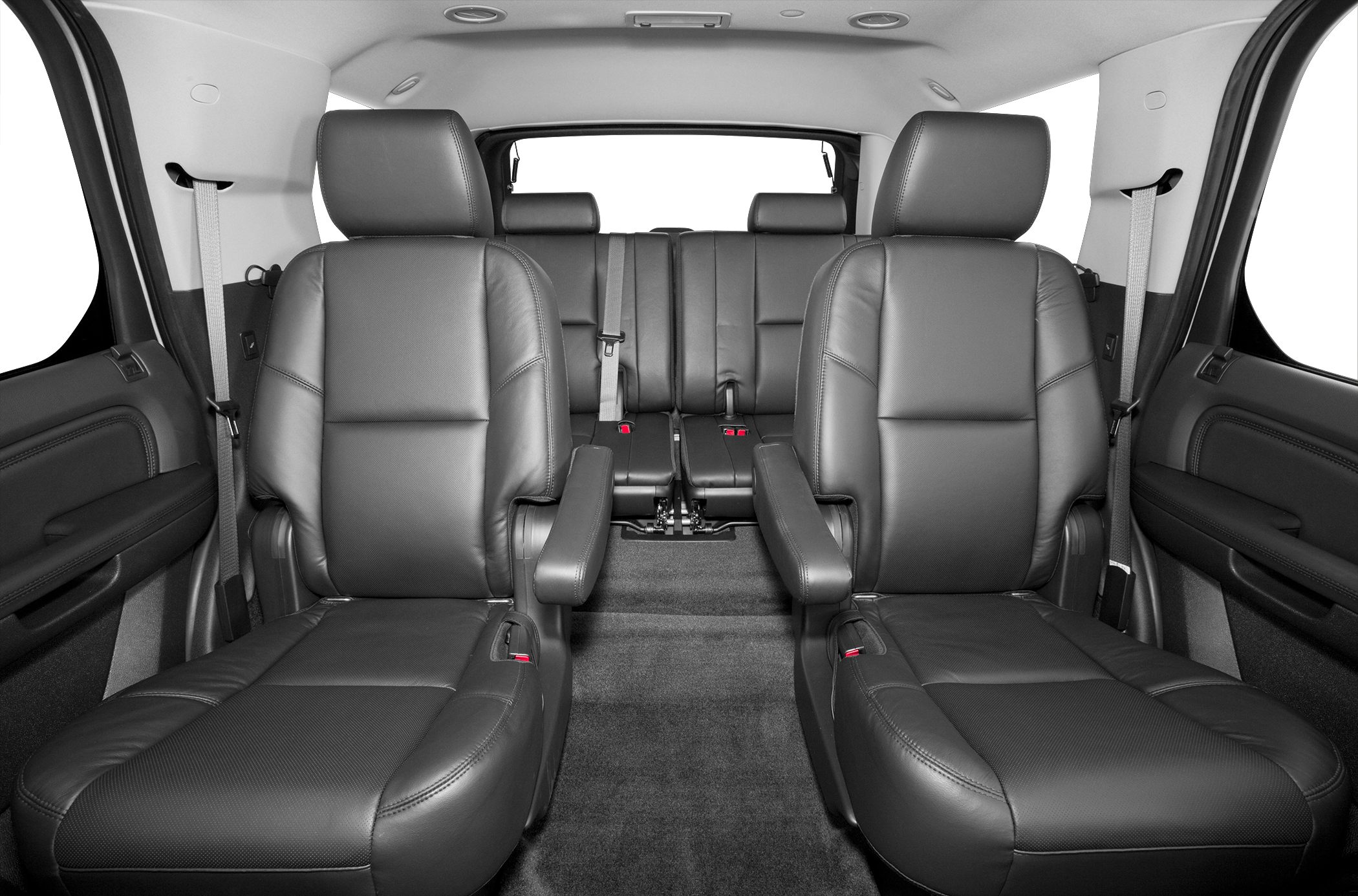 Leather SUV interior with captain chairs and rear bench seating