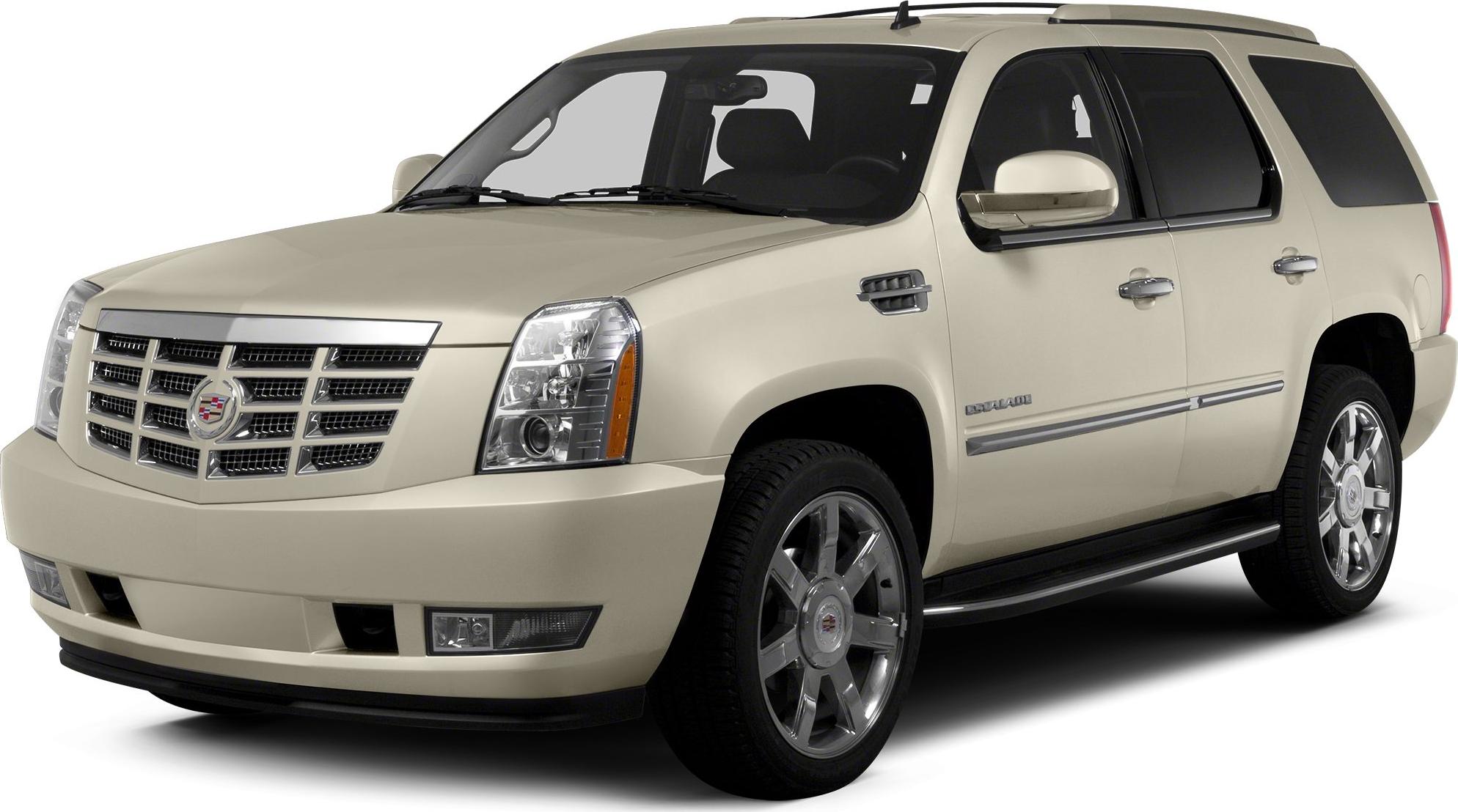 Front-side view of a luxury SUV with chrome wheels and distinctive grille