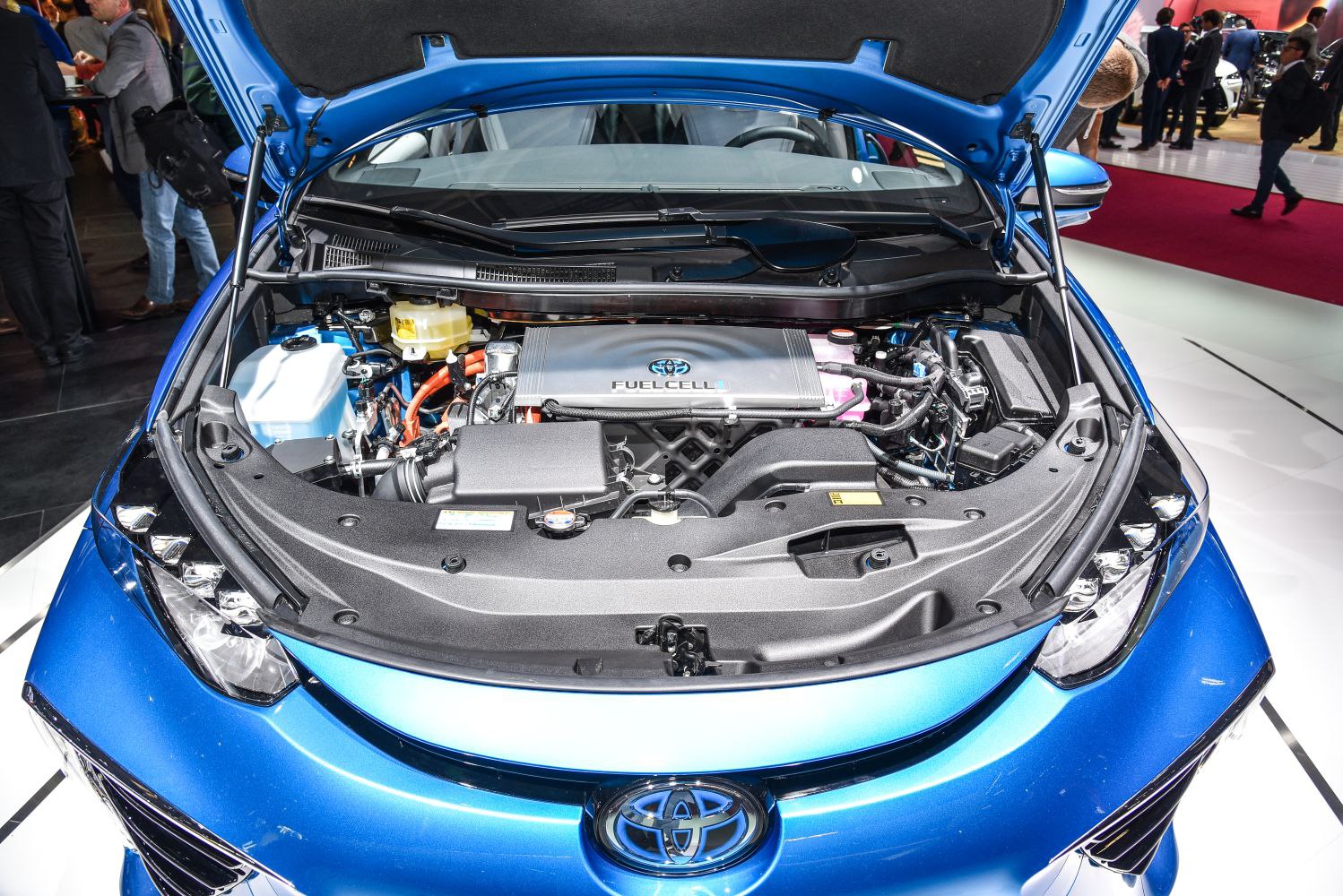 Fuel cell engine bay with visible components and Toyota emblem