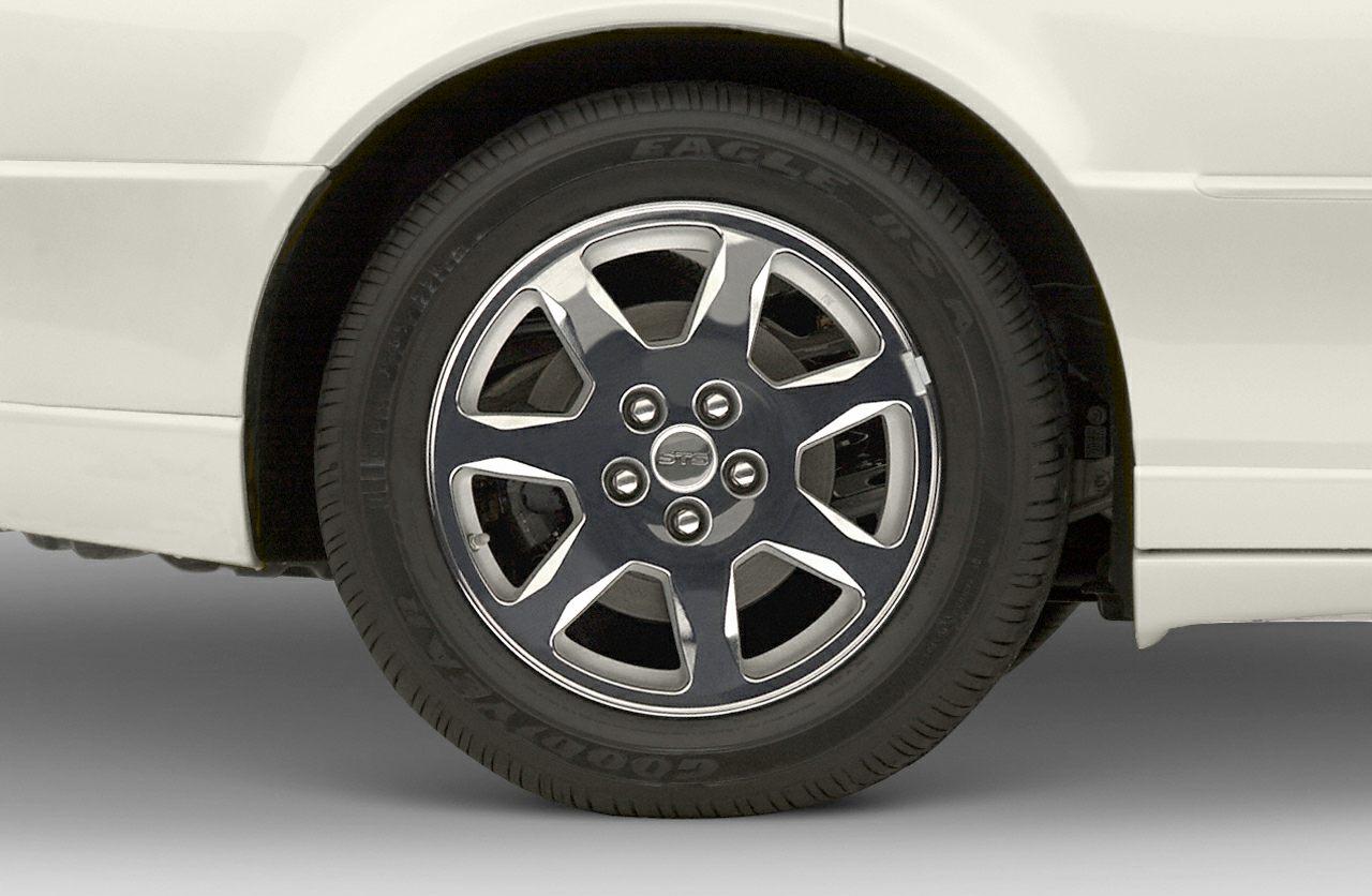 Alloy rim and Goodyear Eagle RSA tire close-up on rear wheel