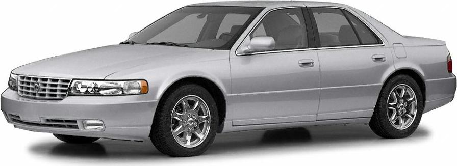 Silver luxury sedan with chrome wheels and large grille.
