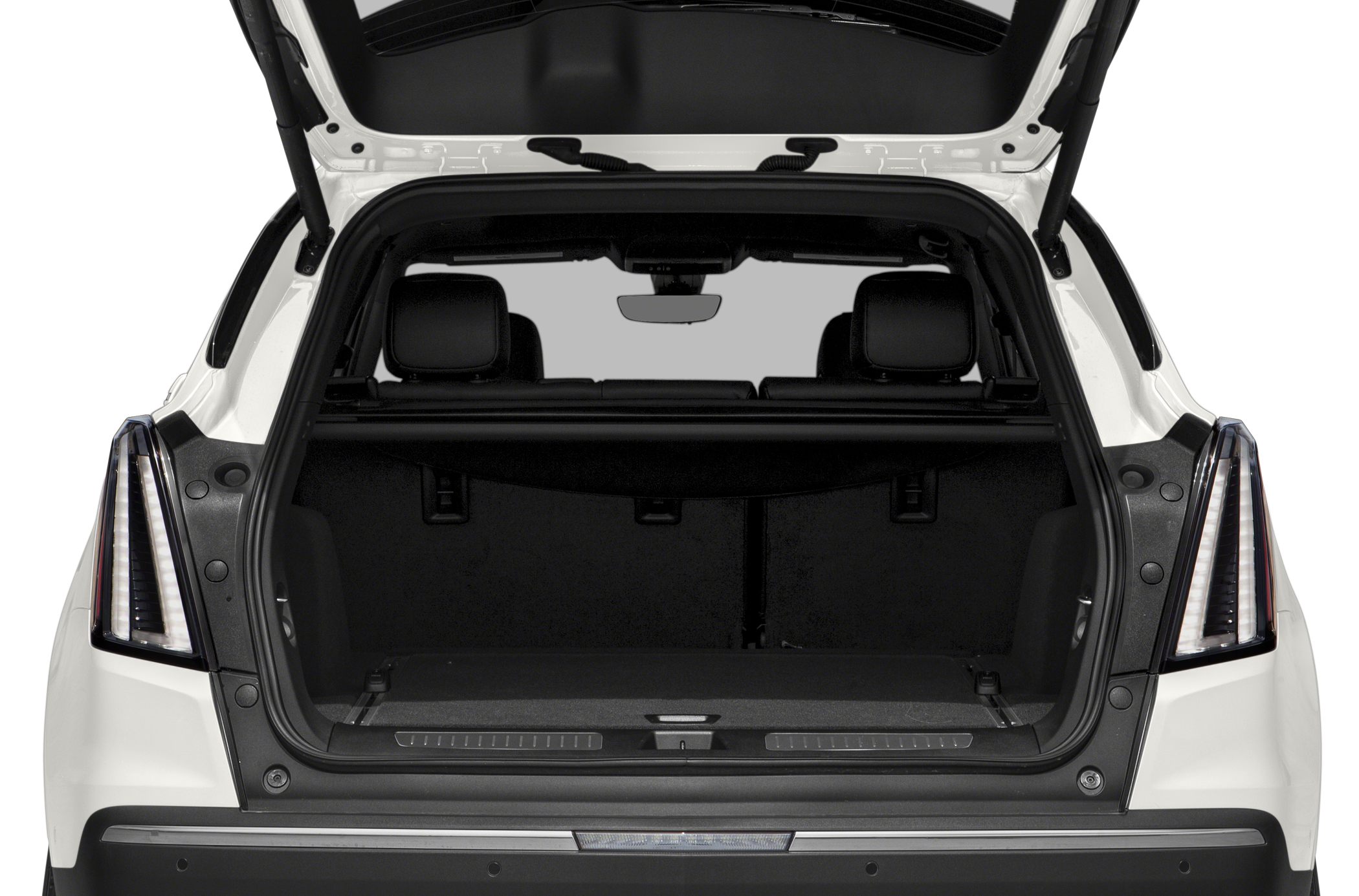 Spacious open SUV trunk with rear seats and headrests visible