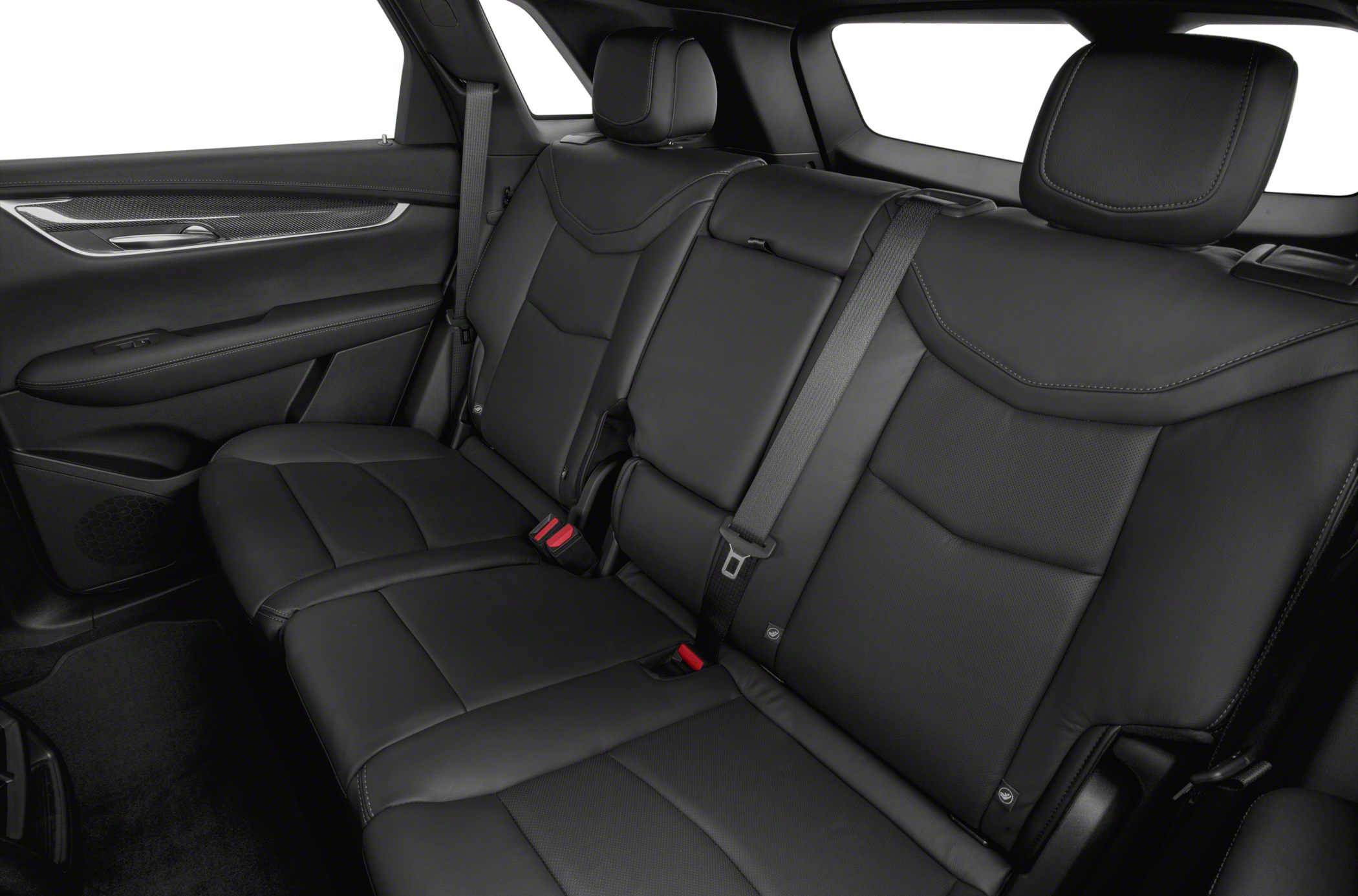 Black leather rear seats with detailed stitching and integrated headrests