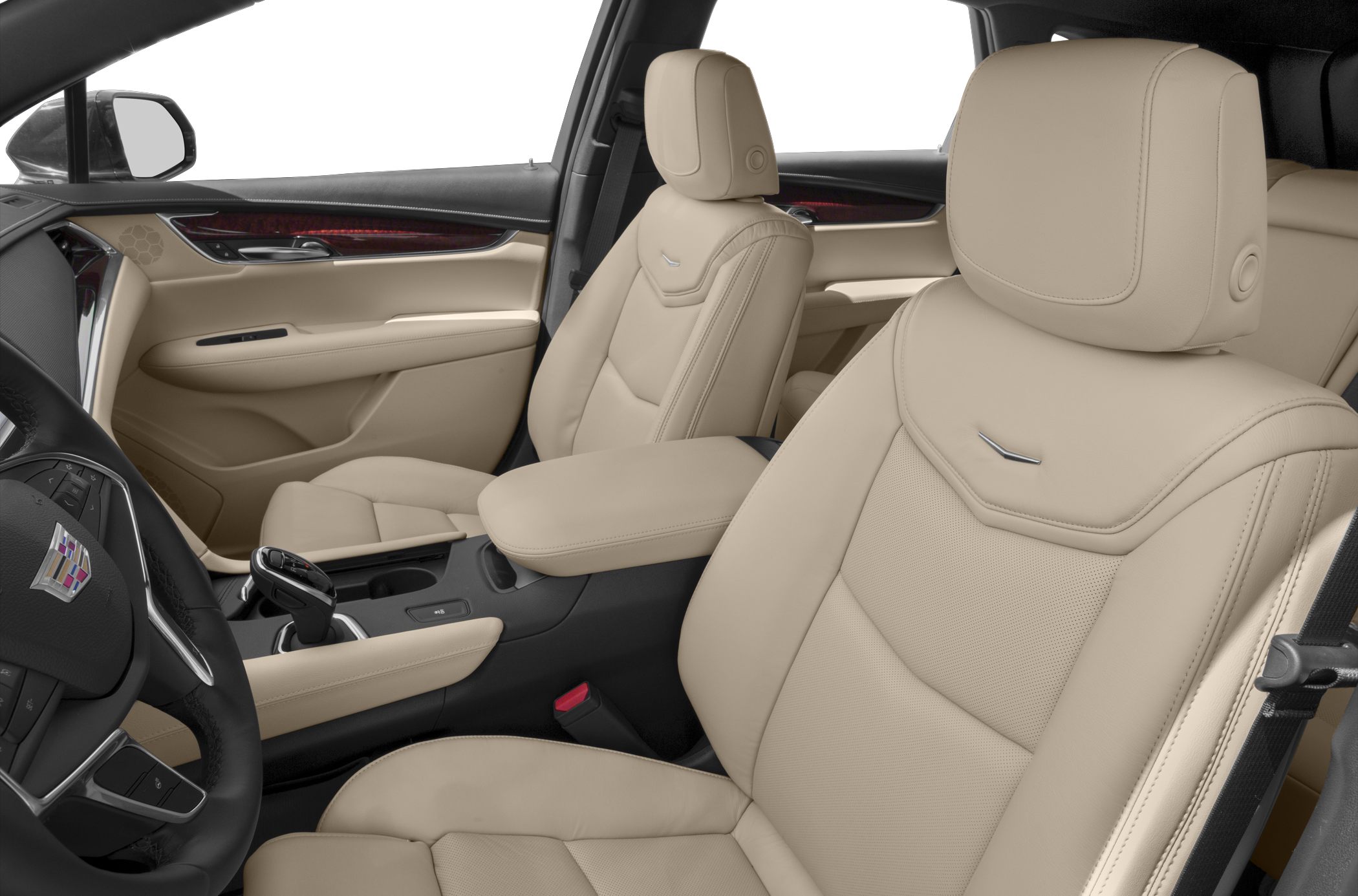 Beige leather seats with detailed stitching and upscale dashboard interior design.