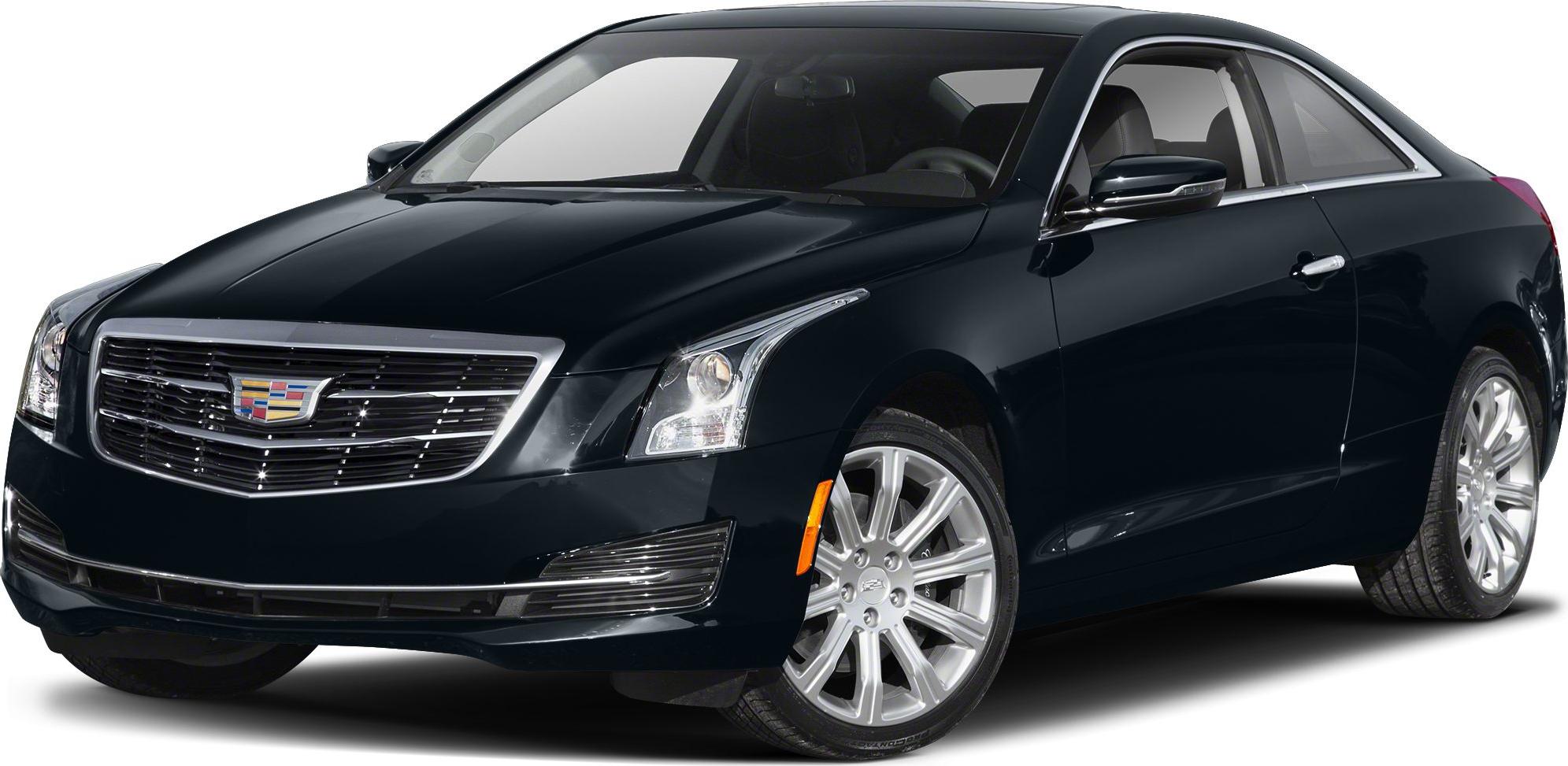 Close-up of front grille, headlights, and alloy wheels of a luxury coupe