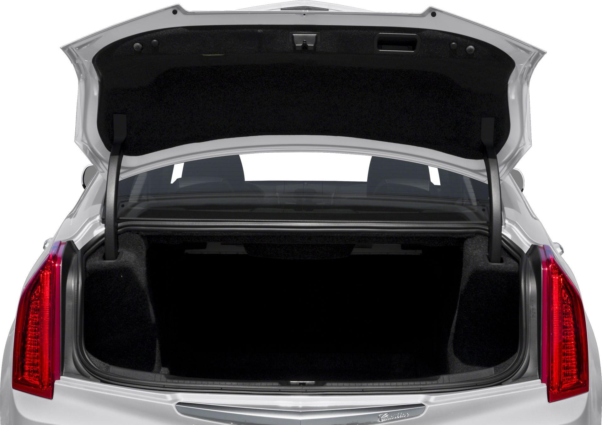 Open trunk with spacious cargo area and clear taillights