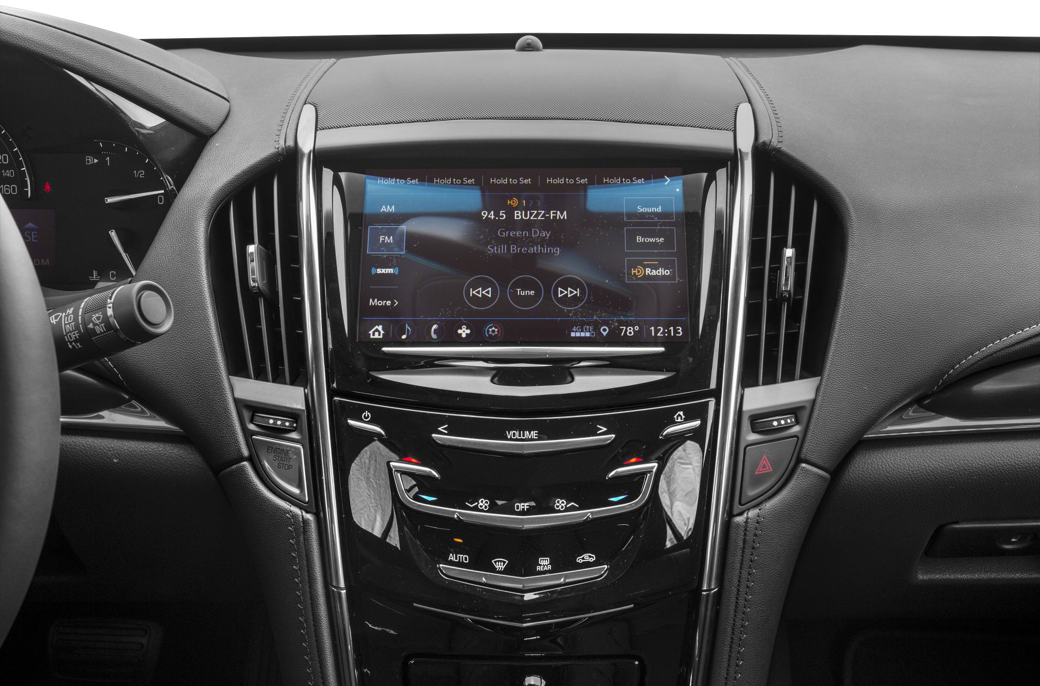 Infotainment touchscreen and climate control center console in car interior
