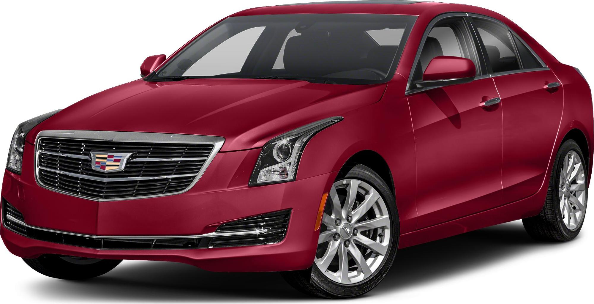 Red sedan front grille and sharp headlights with visible alloy wheels