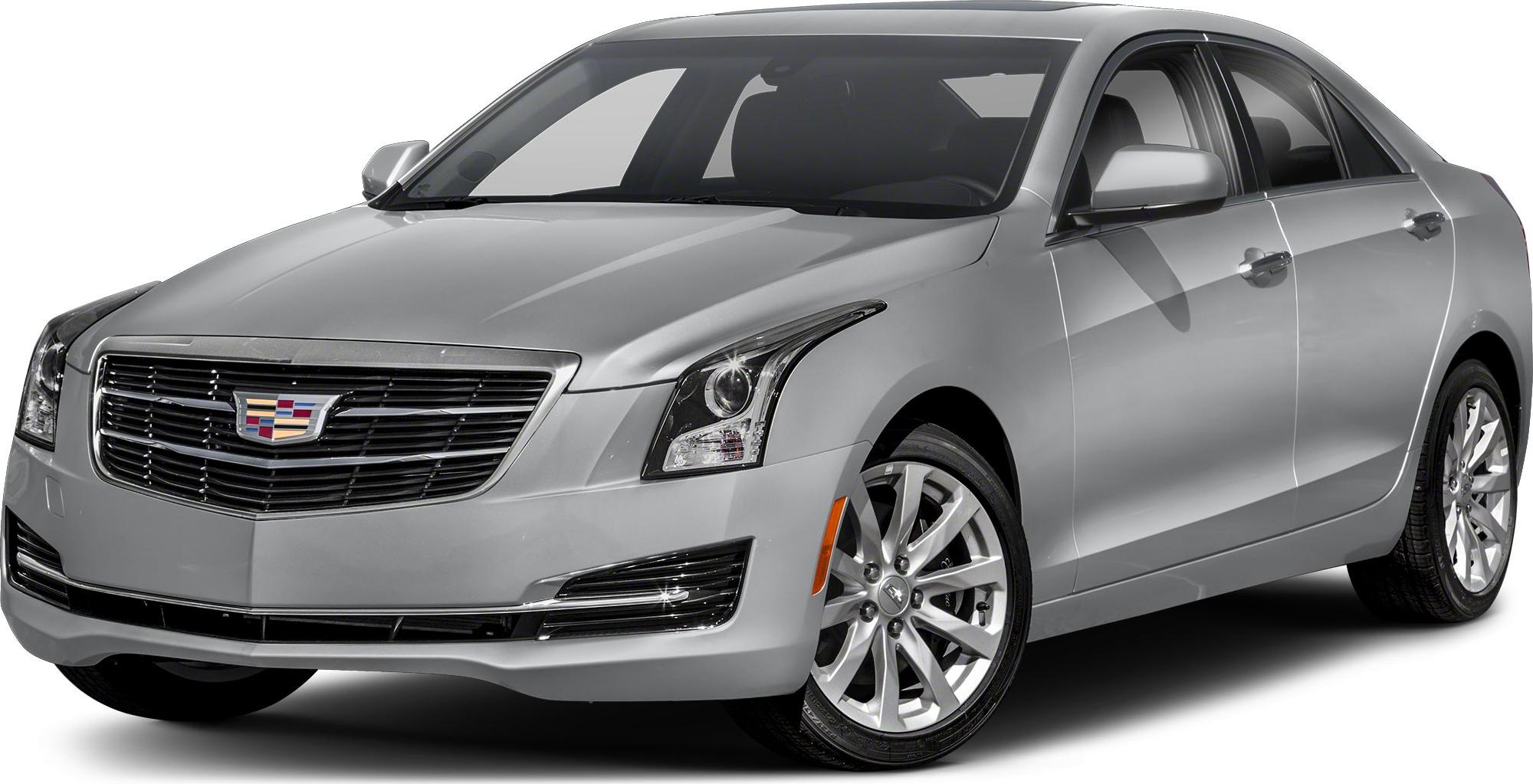 Silver sedan with prominent front grille and LED headlights