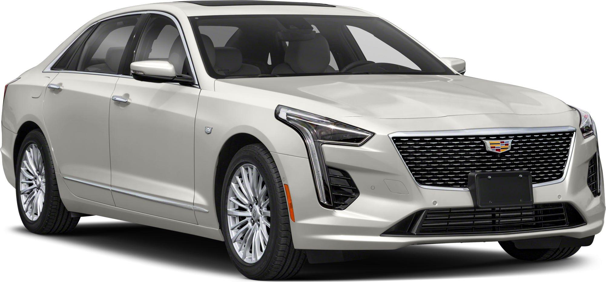 Front 3/4 view of a luxury sedan with distinctive grille and LED headlights