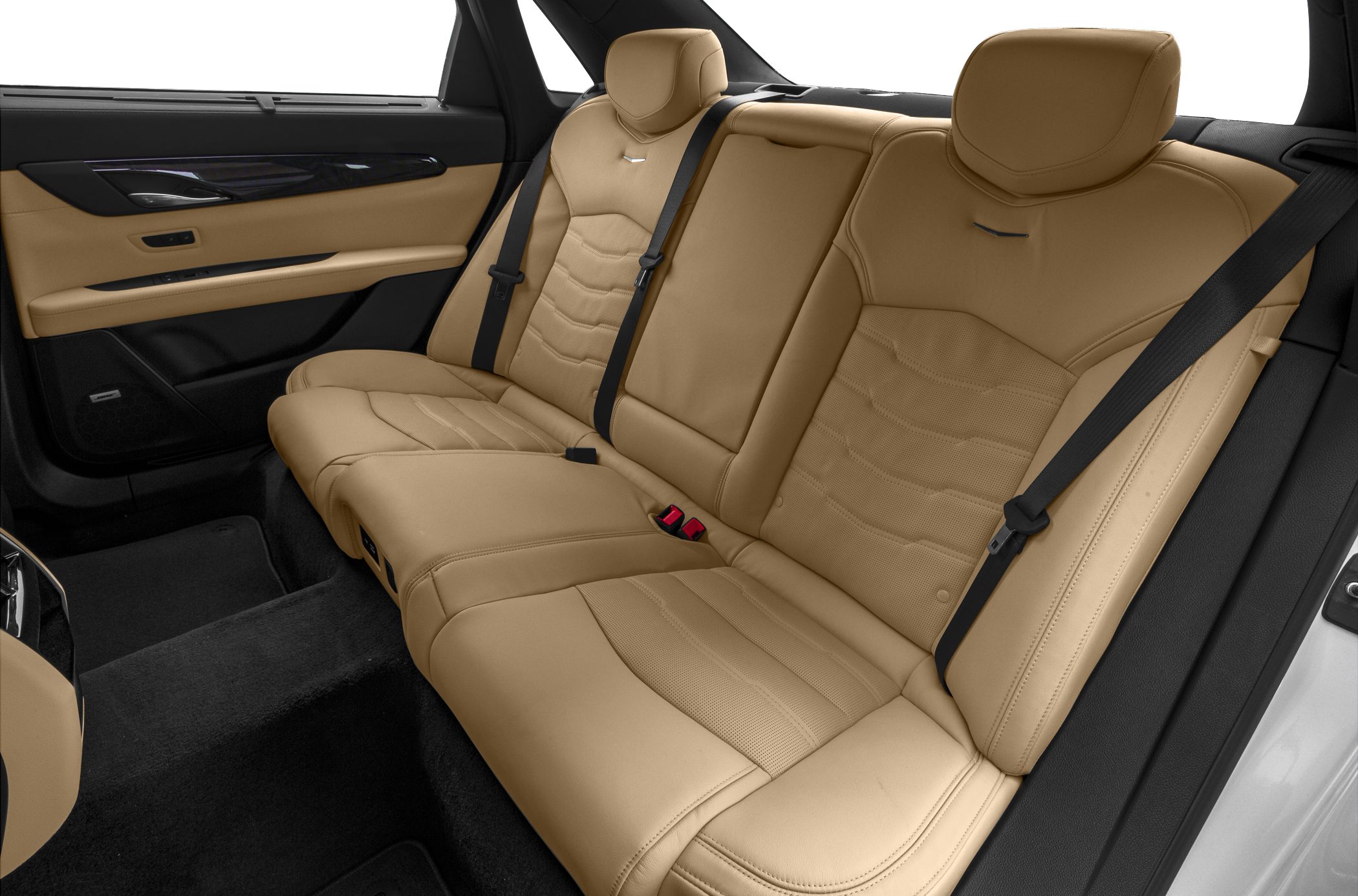 Beige leather rear seats with seat belts and center armrest