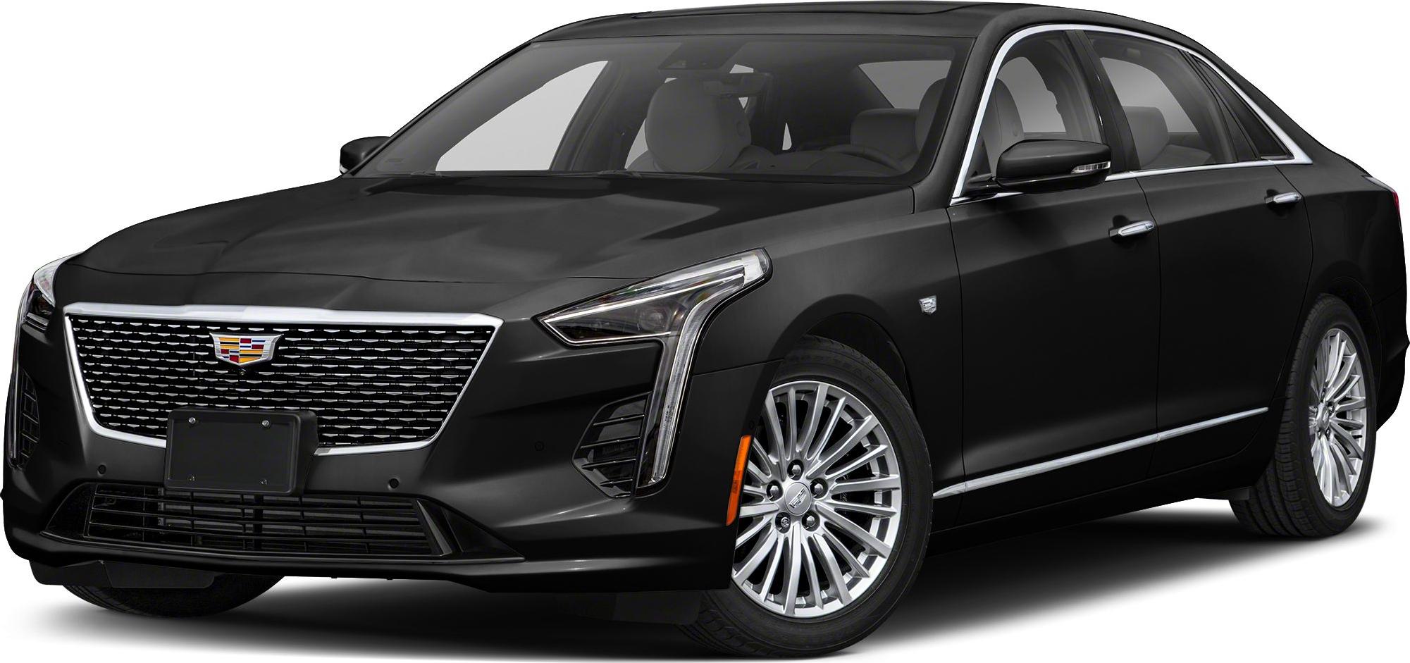 Front and side view of luxury sedan highlighting grille and headlights