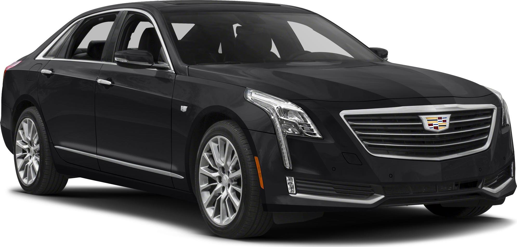 Luxury sedan with vertical LED headlights and large chrome grille