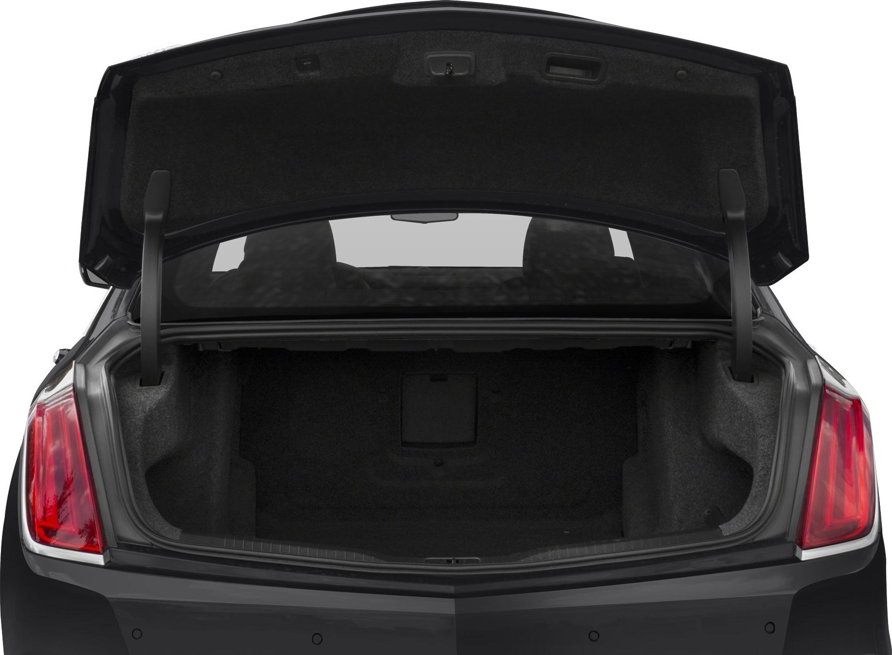 Open sedan trunk with spacious interior and rear taillights