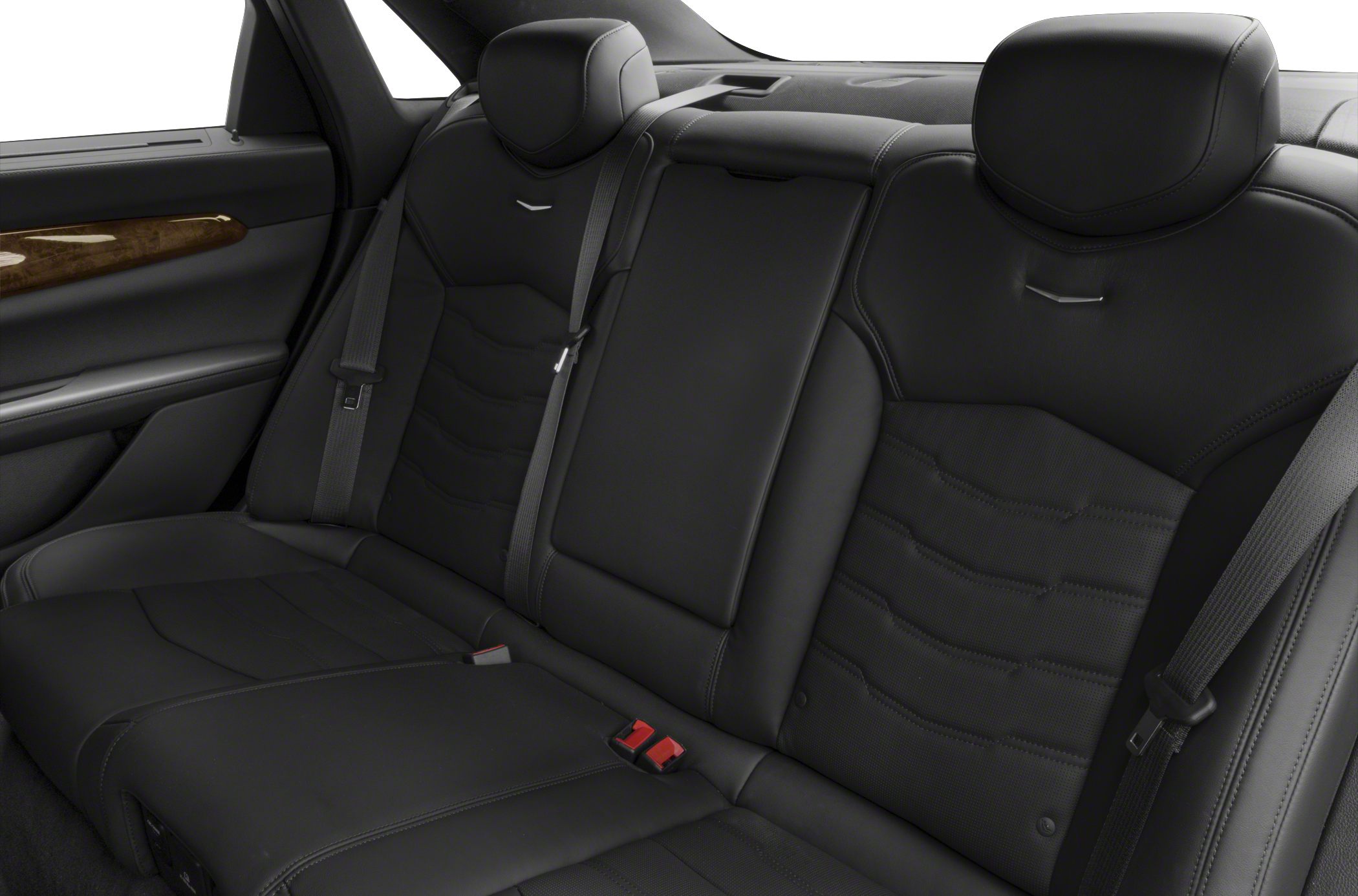 Black leather rear seats with wood trim and seatbelts