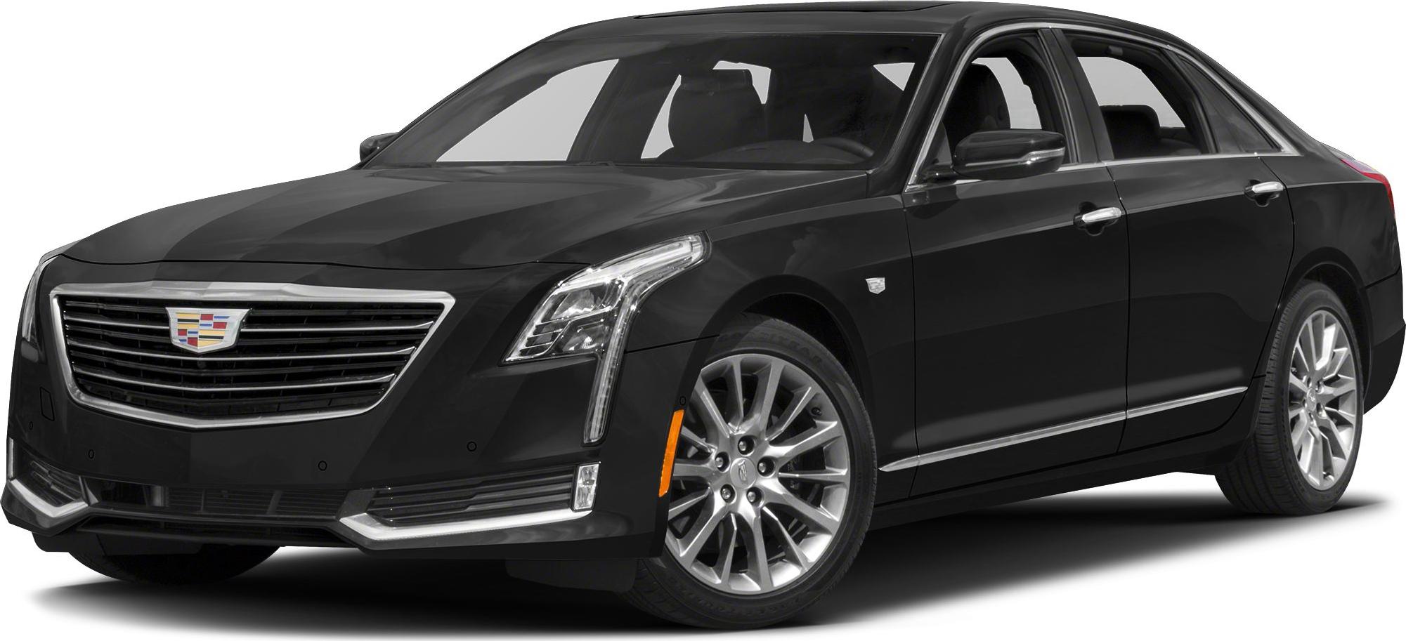 Luxury black sedan with vertical LED headlights and chrome grille