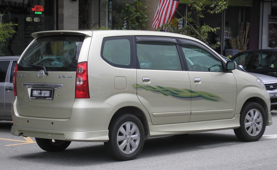Rear and side view with tail lights and green flame decal.