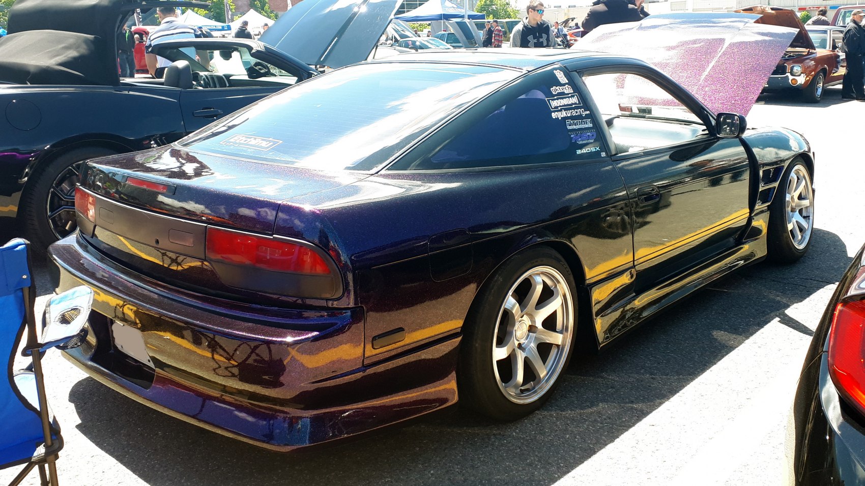 Fastback coupe with modified rear bumper and alloy wheels