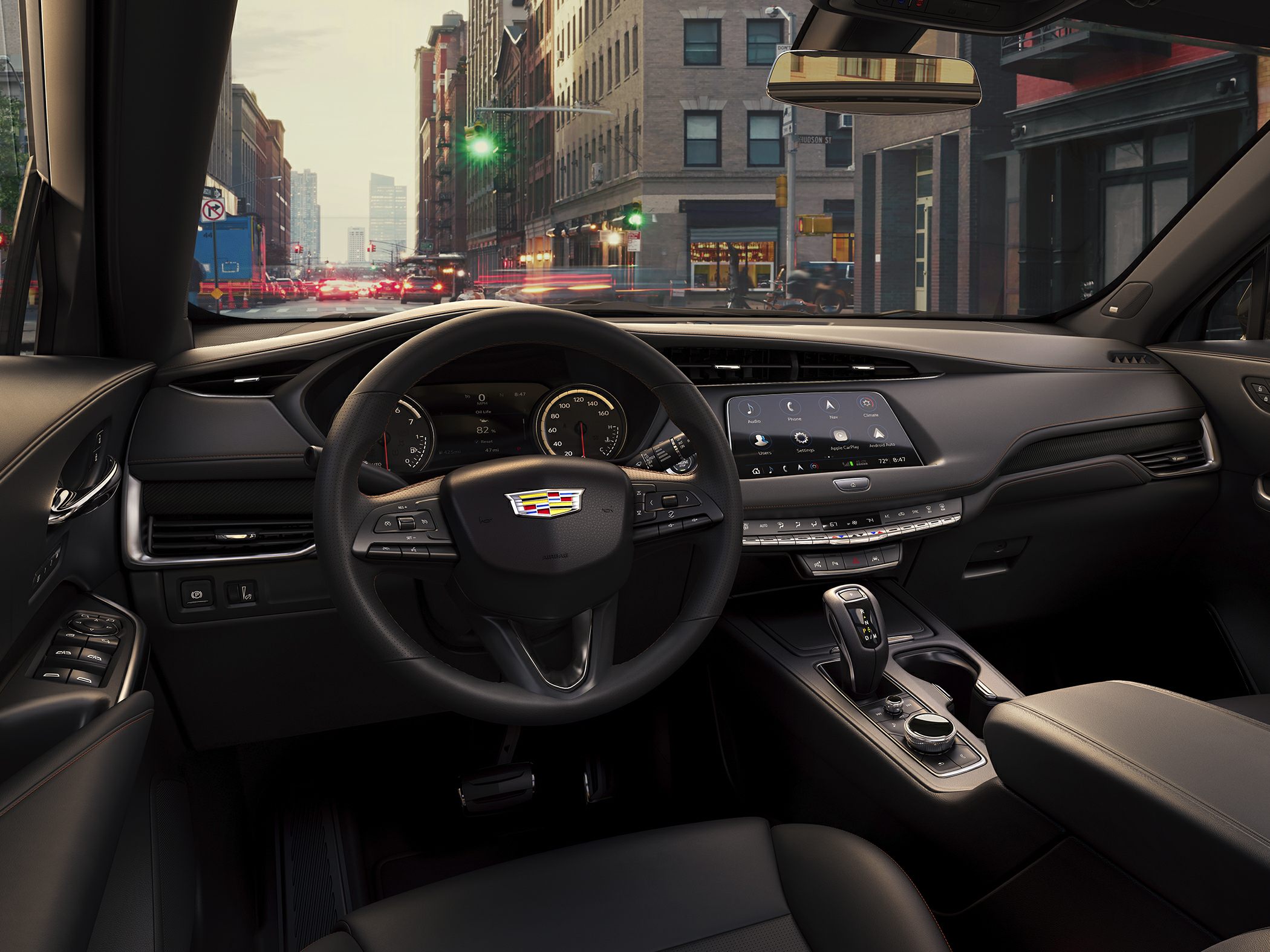 Modern car interior with dashboard and steering wheel view