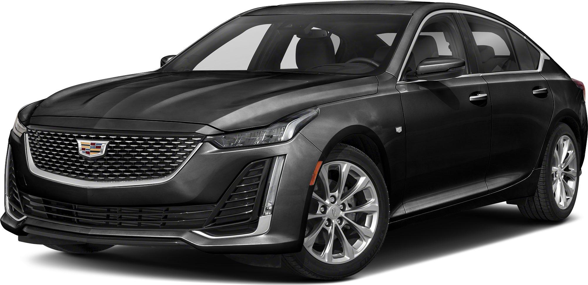 Front profile of a luxury sedan with grille and alloy wheels