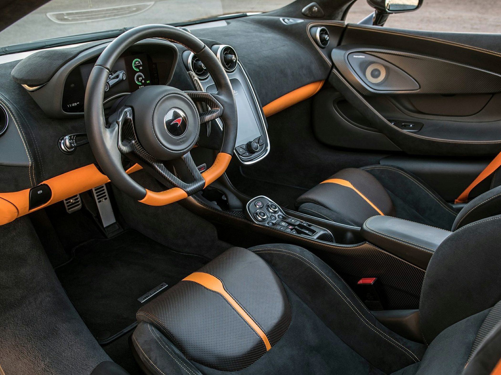 Interior view with carbon fiber steering wheel and leather seats