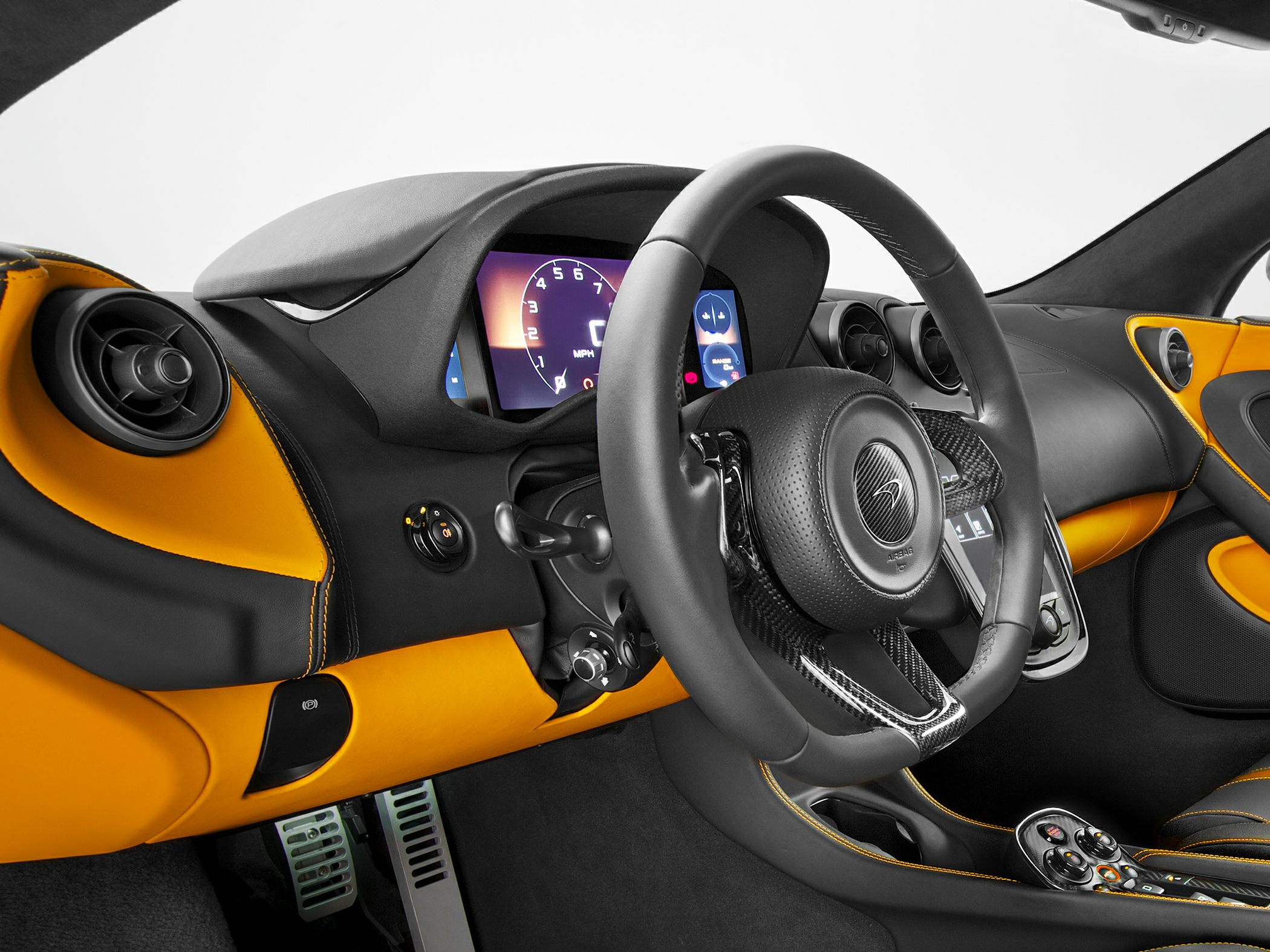 Steering wheel with carbon fiber and digital dashboard inside luxury sports car