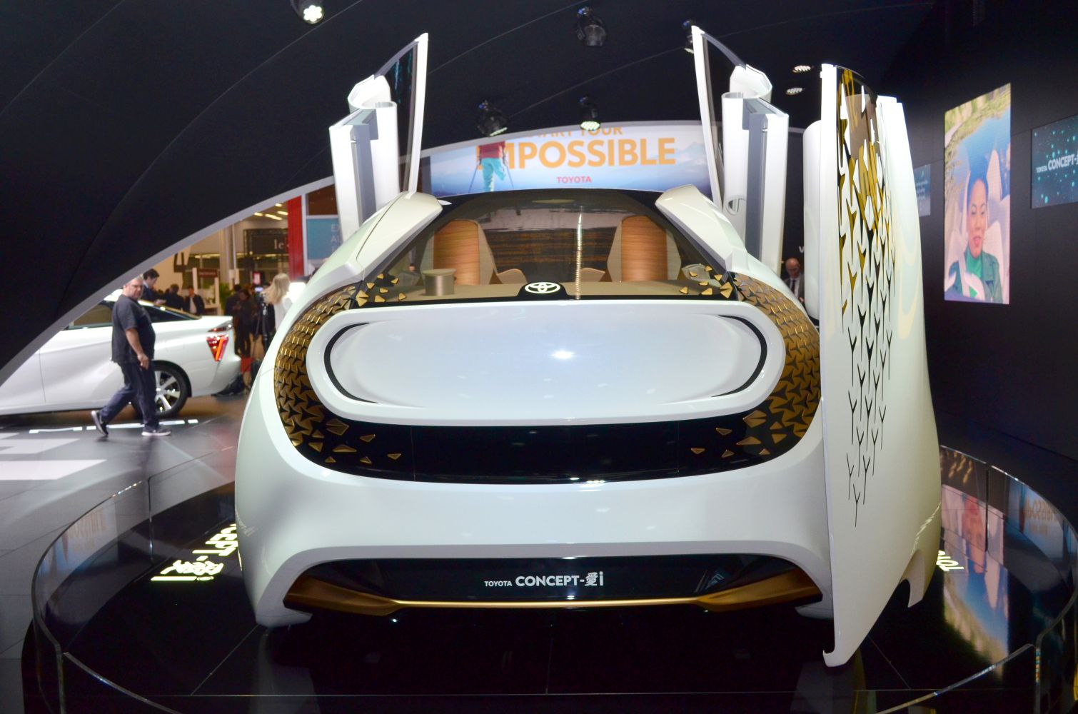 Futuristic rear design with butterfly doors and illuminated panel