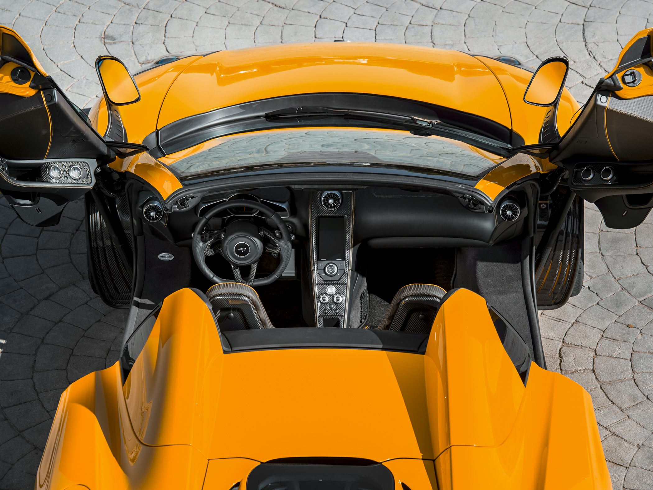 Open top interior with distinctive dihedral doors
