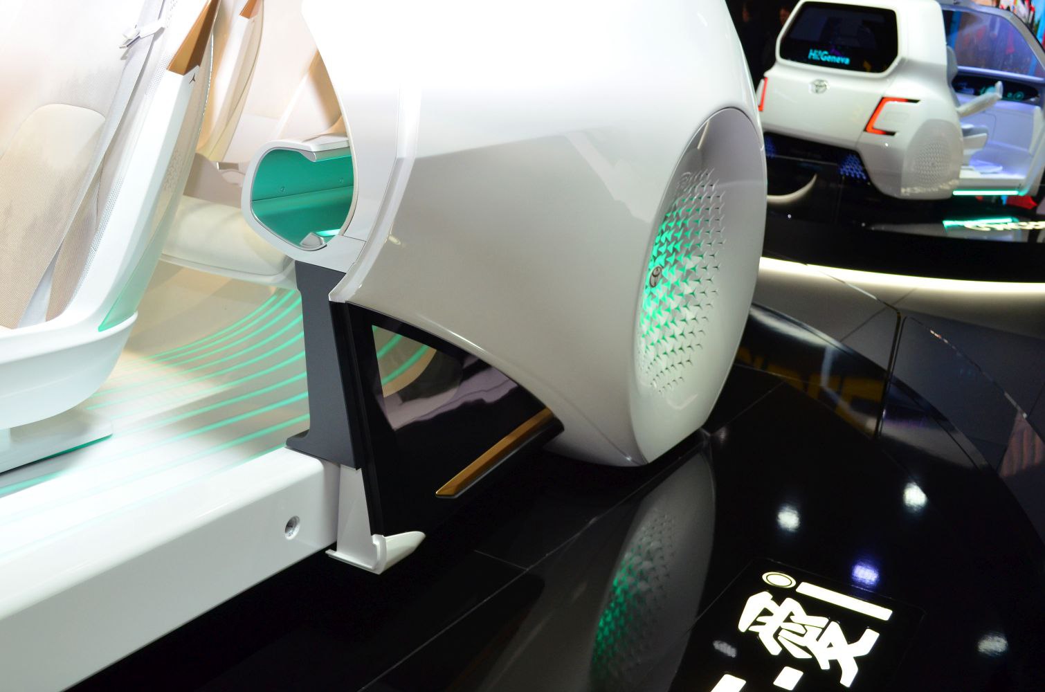 Futuristic wheel design and open door with modern interior