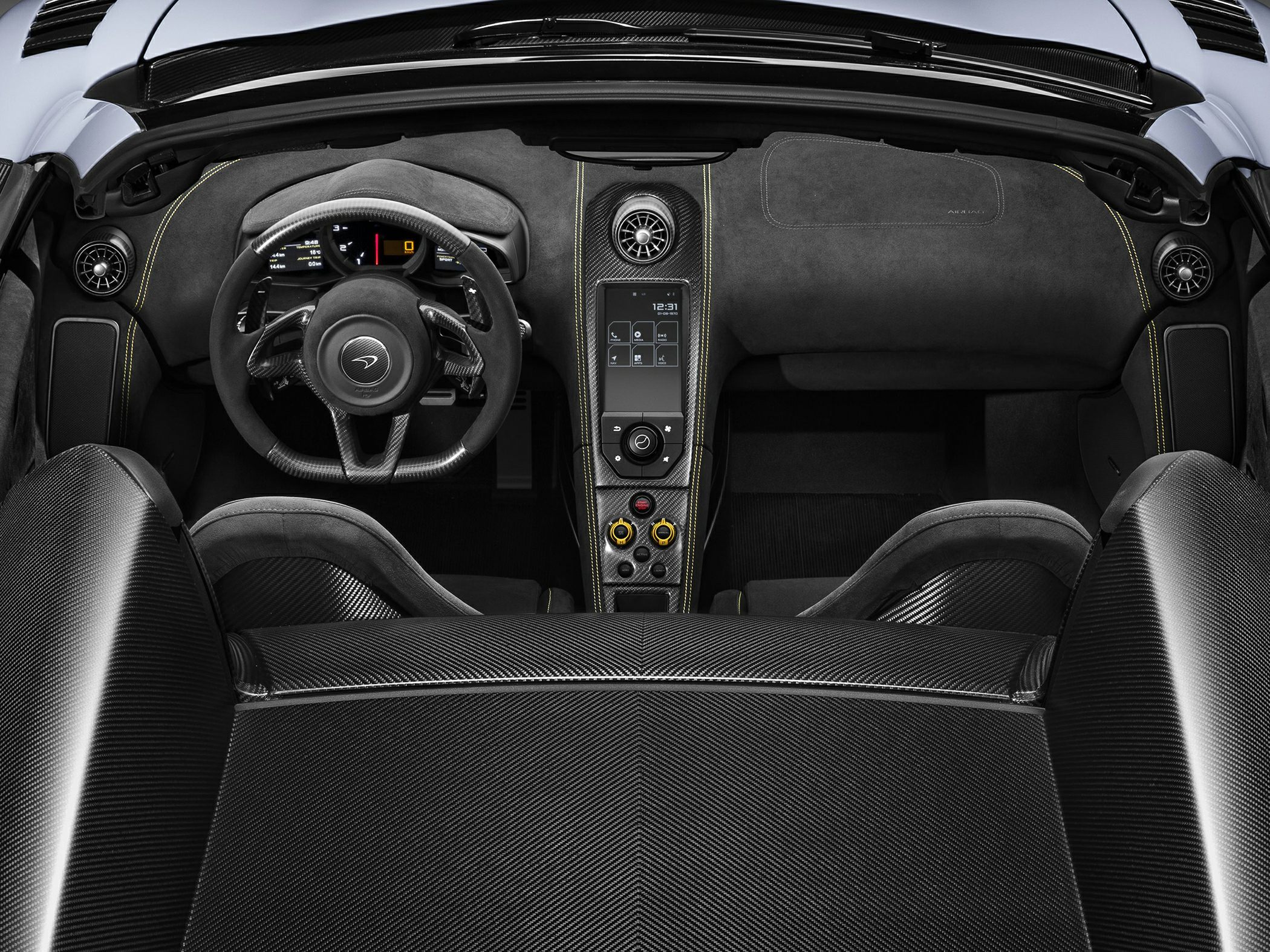 Carbon fiber interior trim, digital dashboard, sport seats