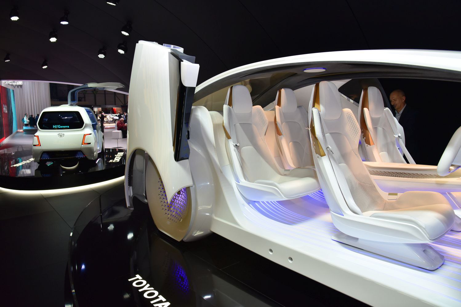 Futuristic interior with white seats and butterfly door design