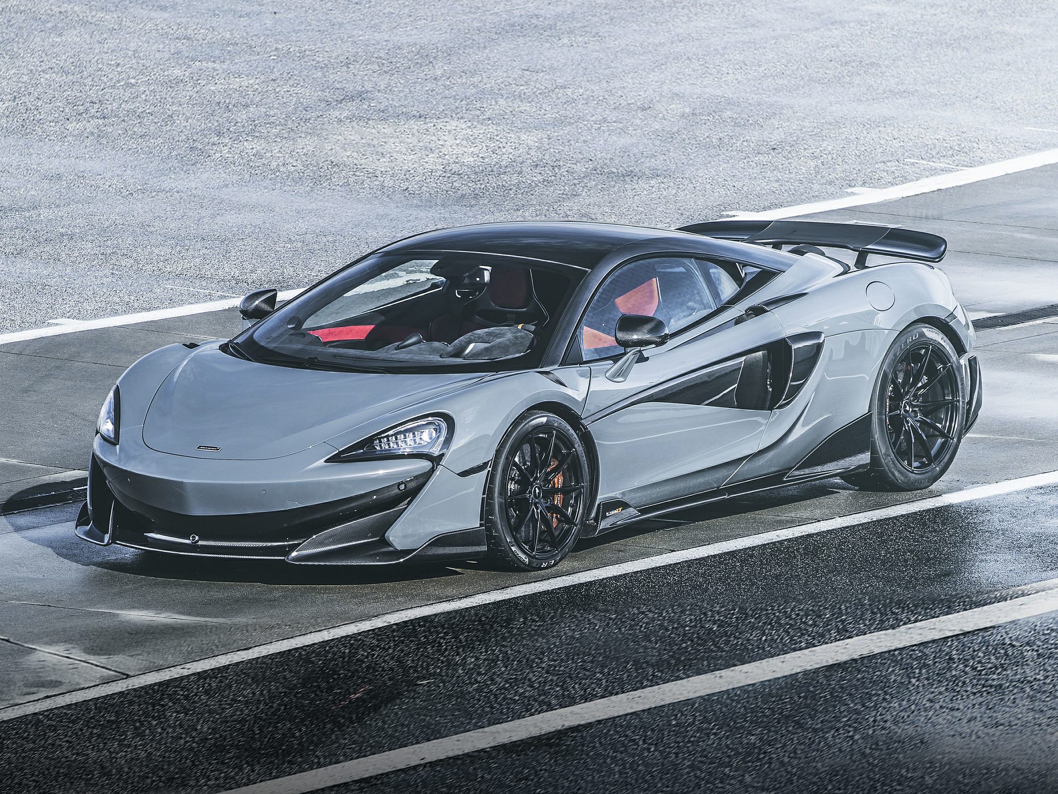 Aerodynamic sports car with distinctive rear wing and sleek body lines
