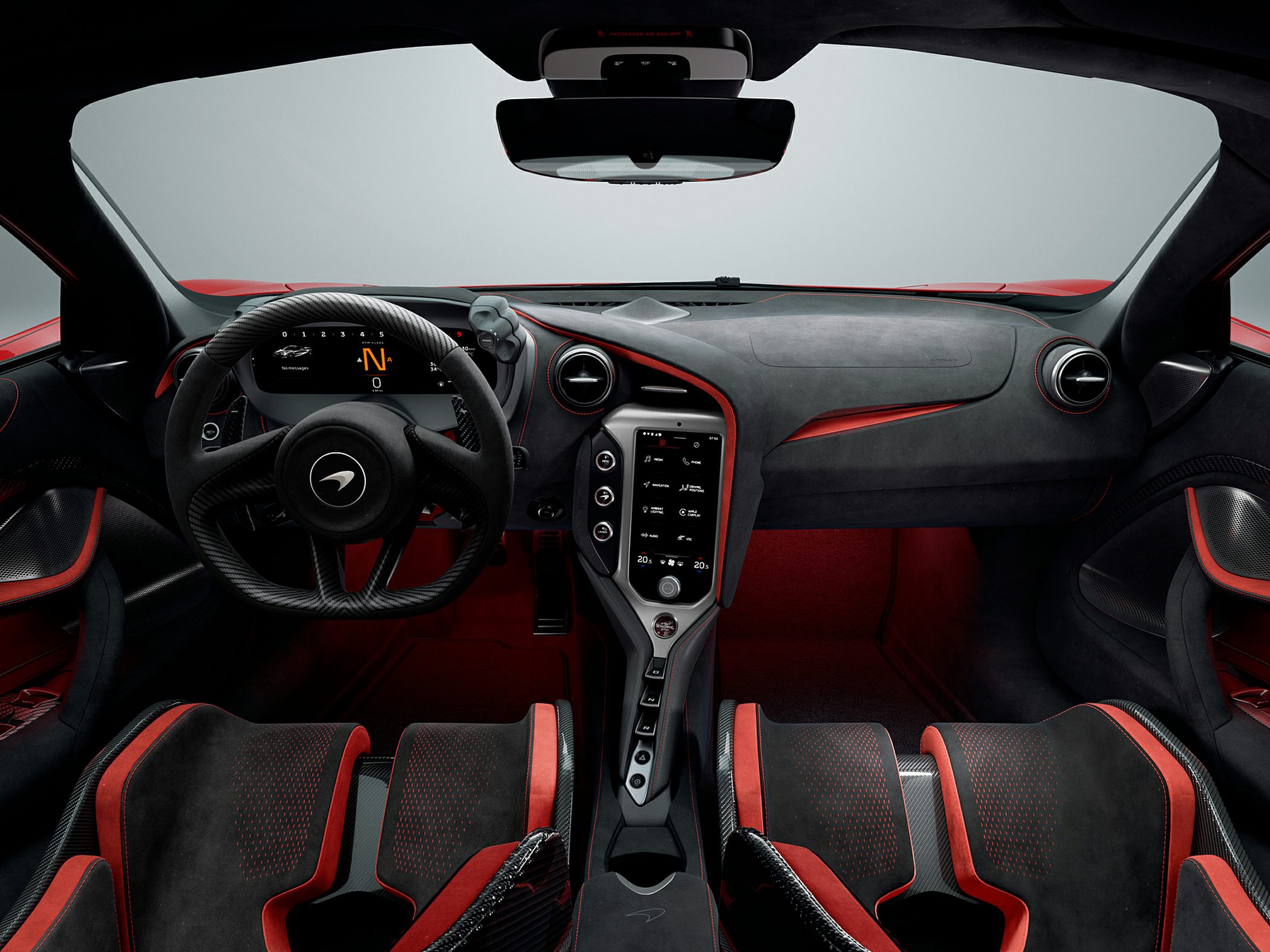 Carbon fiber steering wheel and sporty seats with digital cockpit and red accents.