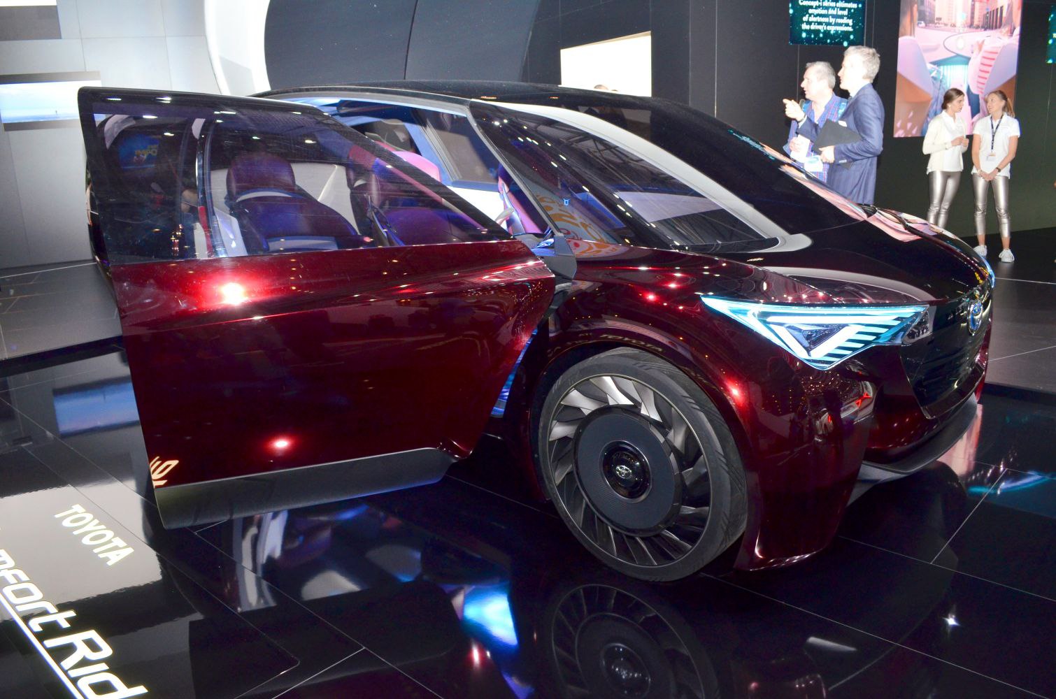 Futuristic LED headlights and turbine-style wheel design on concept vehicle