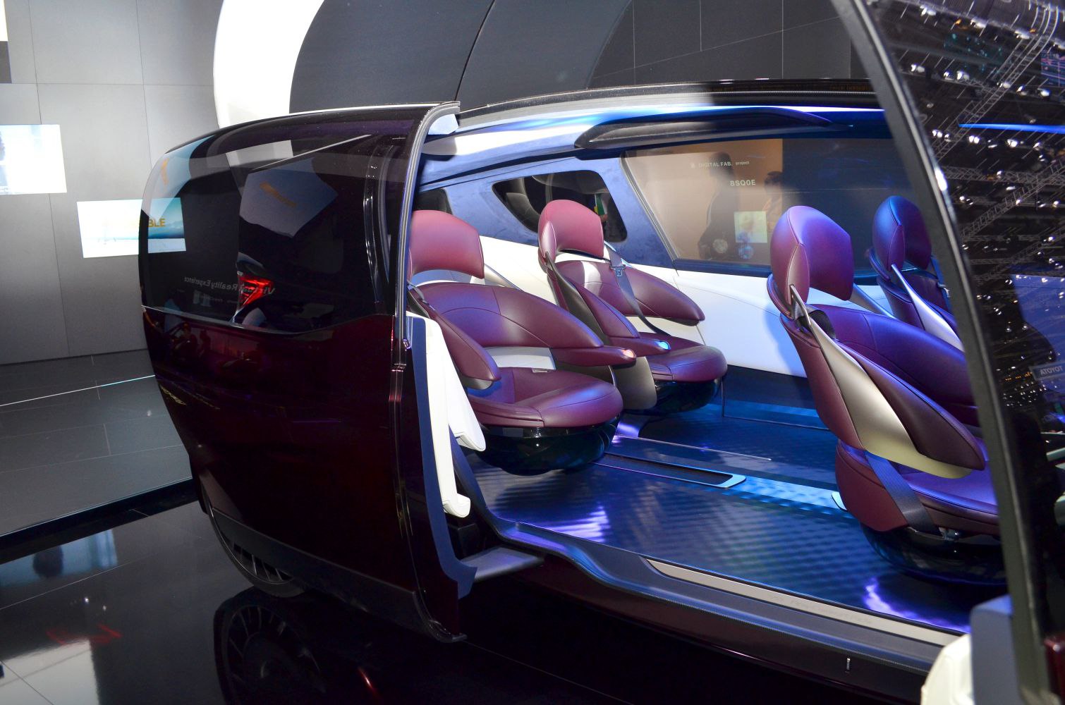 Futuristic interior with purple individual seats and spacious cabin