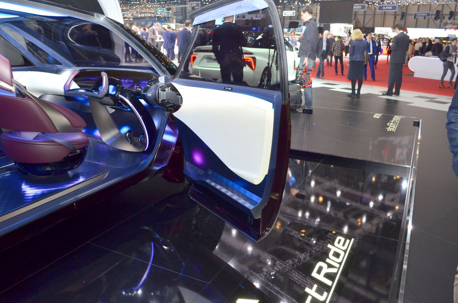 Futuristic car interior with innovative door and advanced steering design