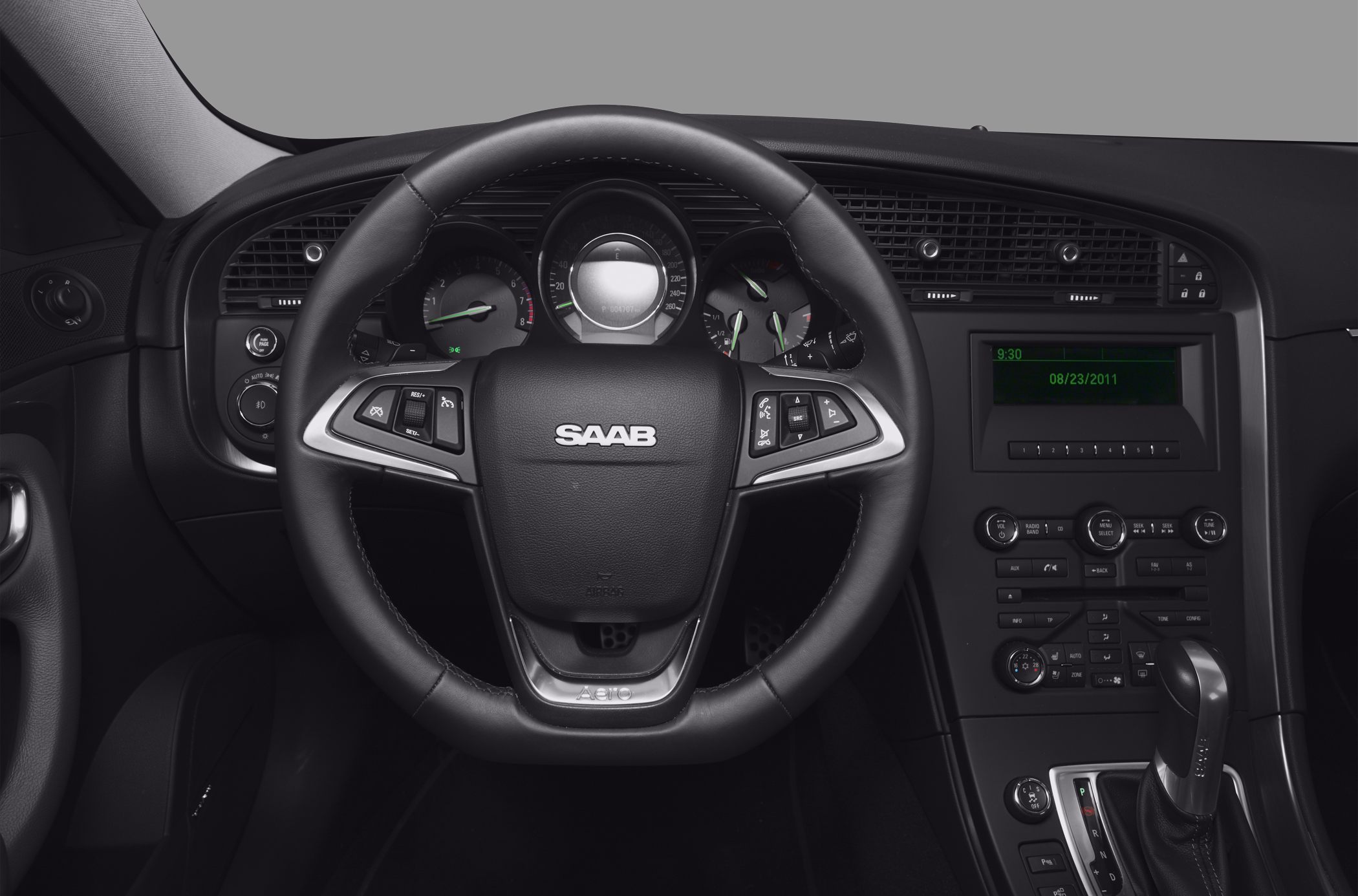 Multifunction steering wheel and dashboard with instrument cluster and center console