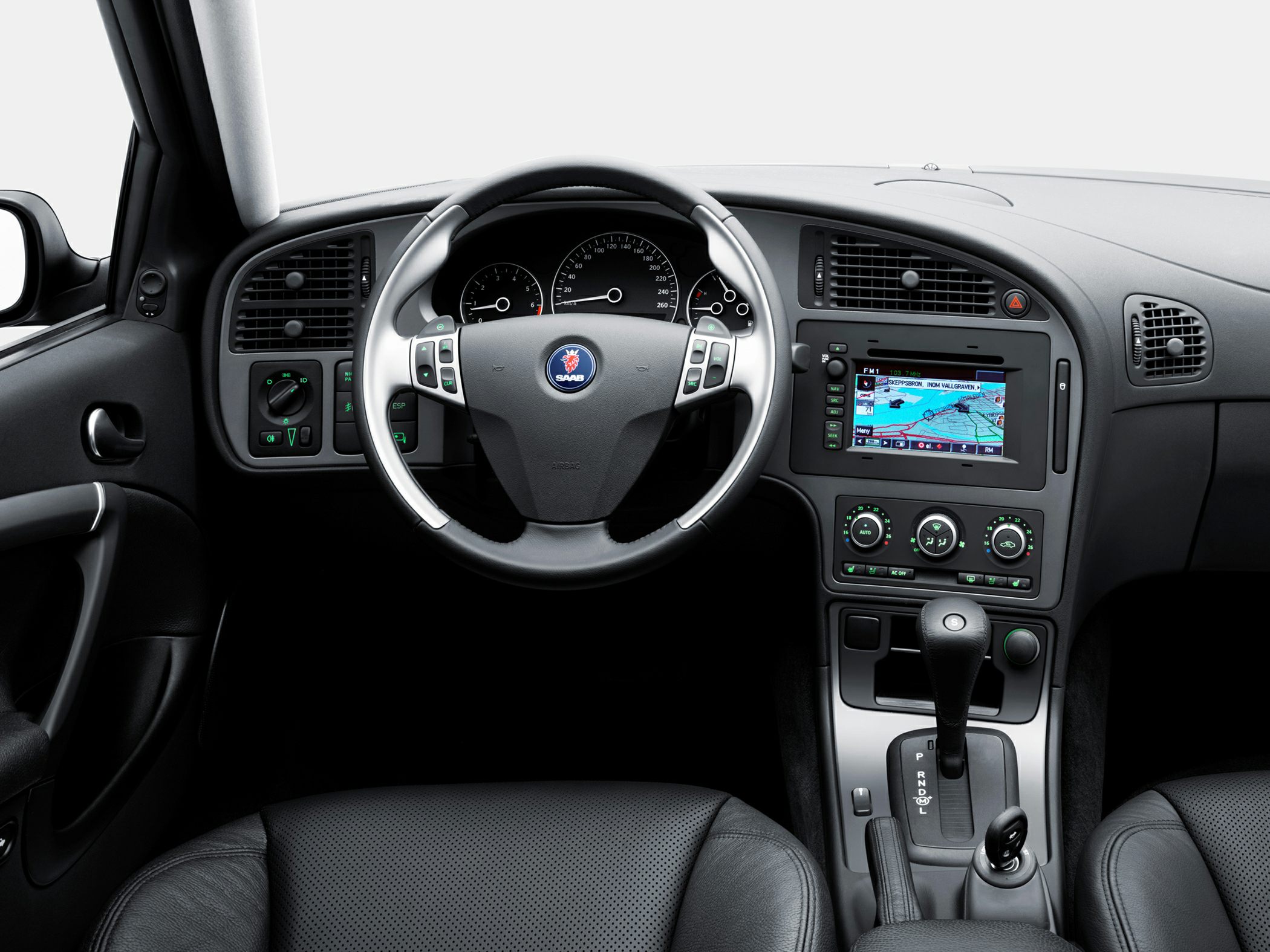 Steering wheel, dashboard, and center console with navigation system