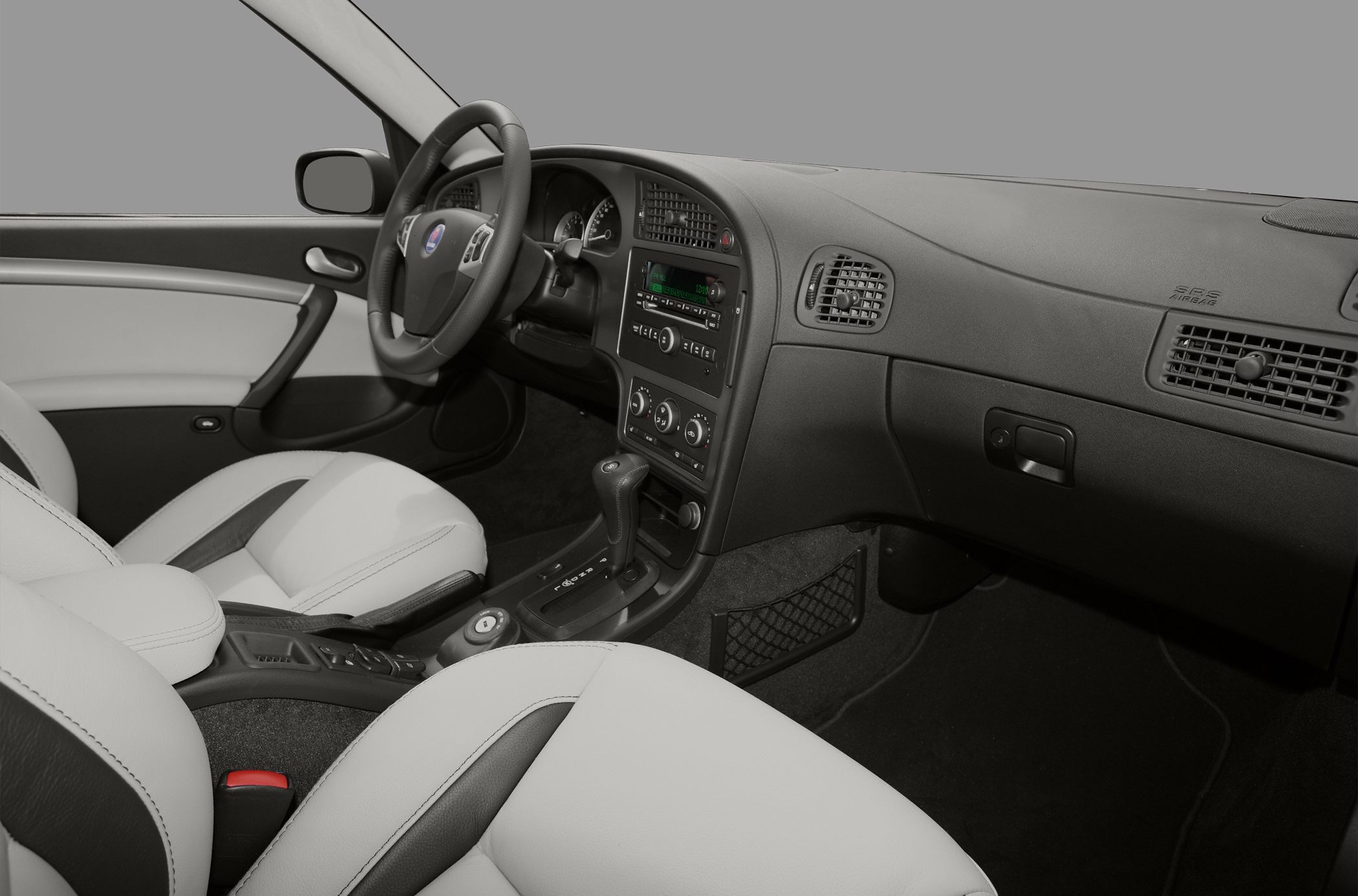 Dashboard, steering wheel, front seats of a car interior