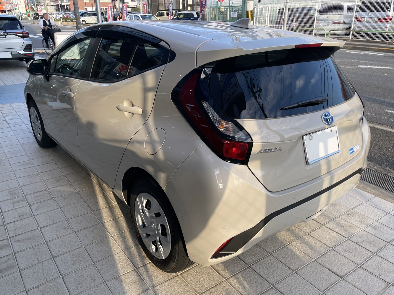 Side and rear view of a compact hatchback with modern design features